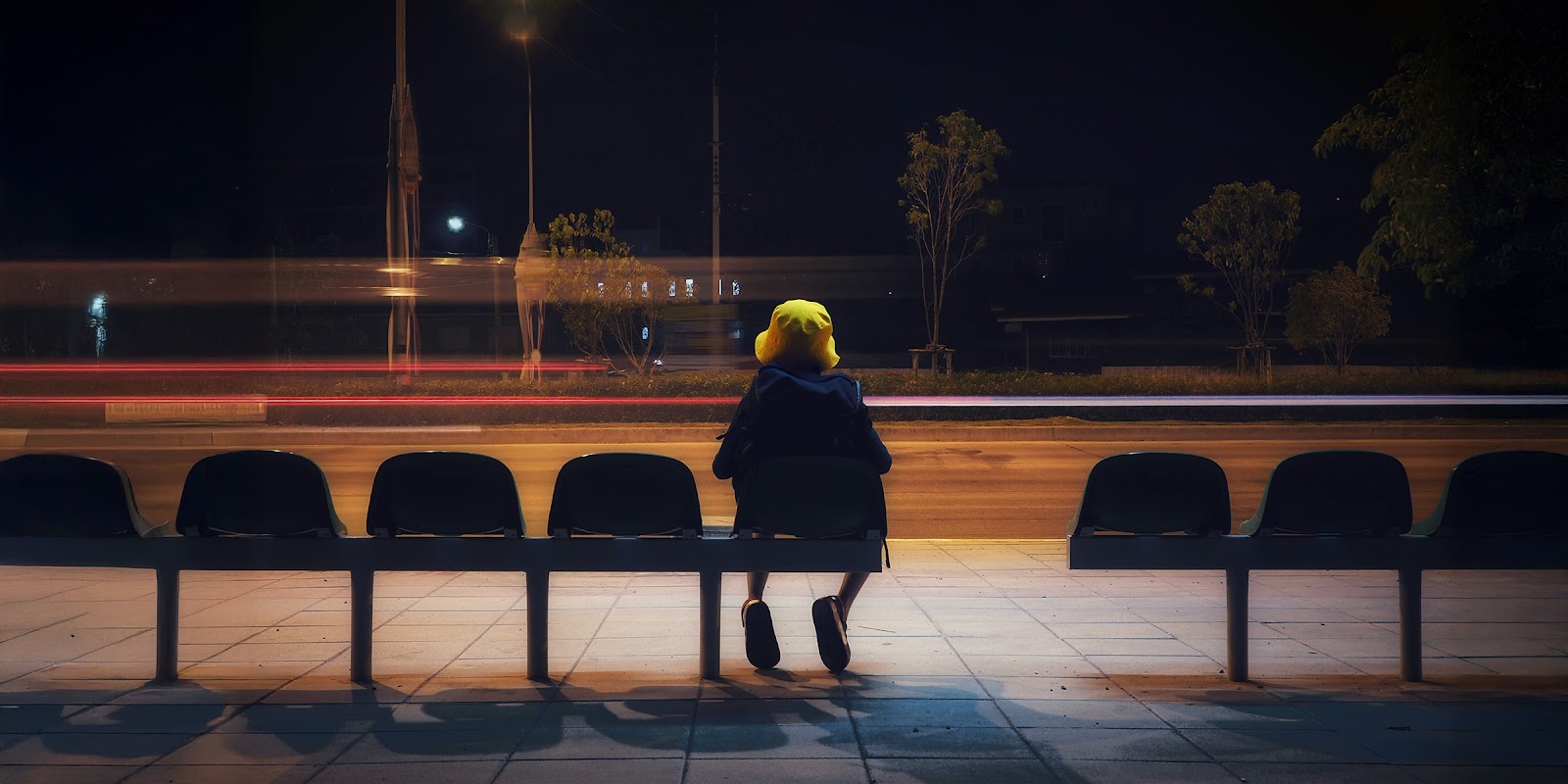 A boy on a bus station | Source: Shutterstock