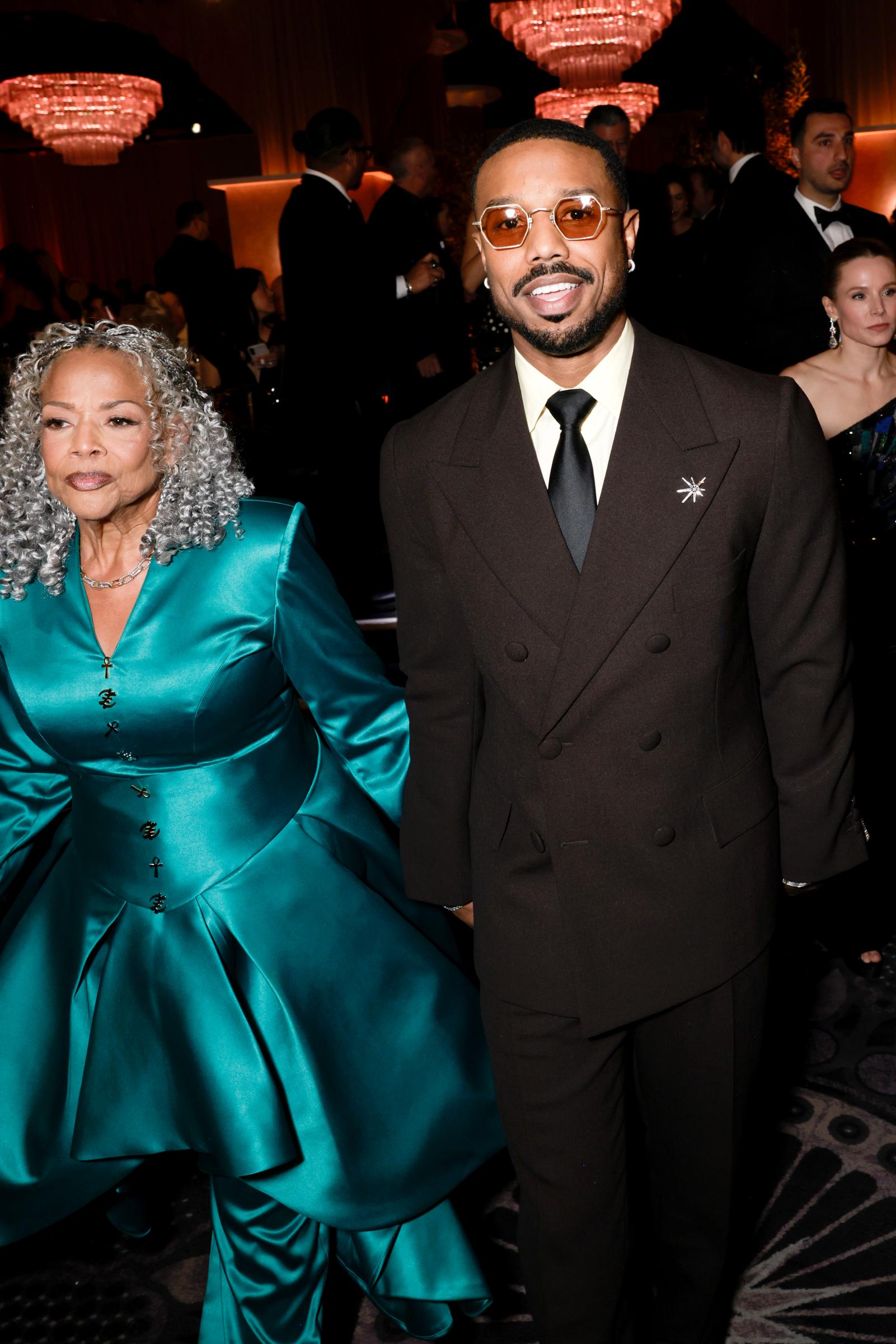 Michael B. Jordan walking inside the ceremony venue with his mom, Donna Jordan. | Source: Getty Images