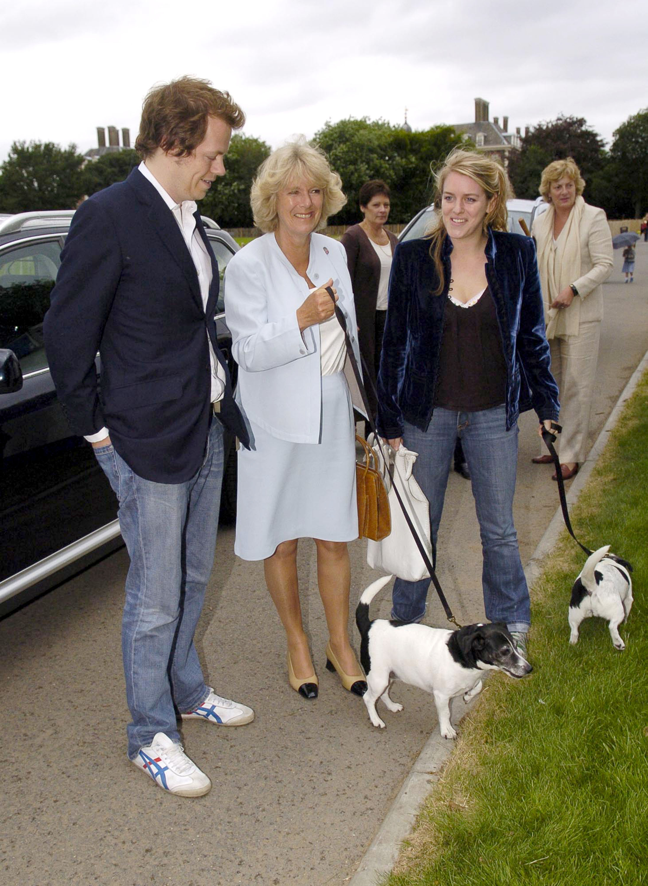 Tom Parker Bowles, Queen Camilla, and Laura Lopes during Macmillan Dog Day on July 5, 2005. | Source: Getty Images