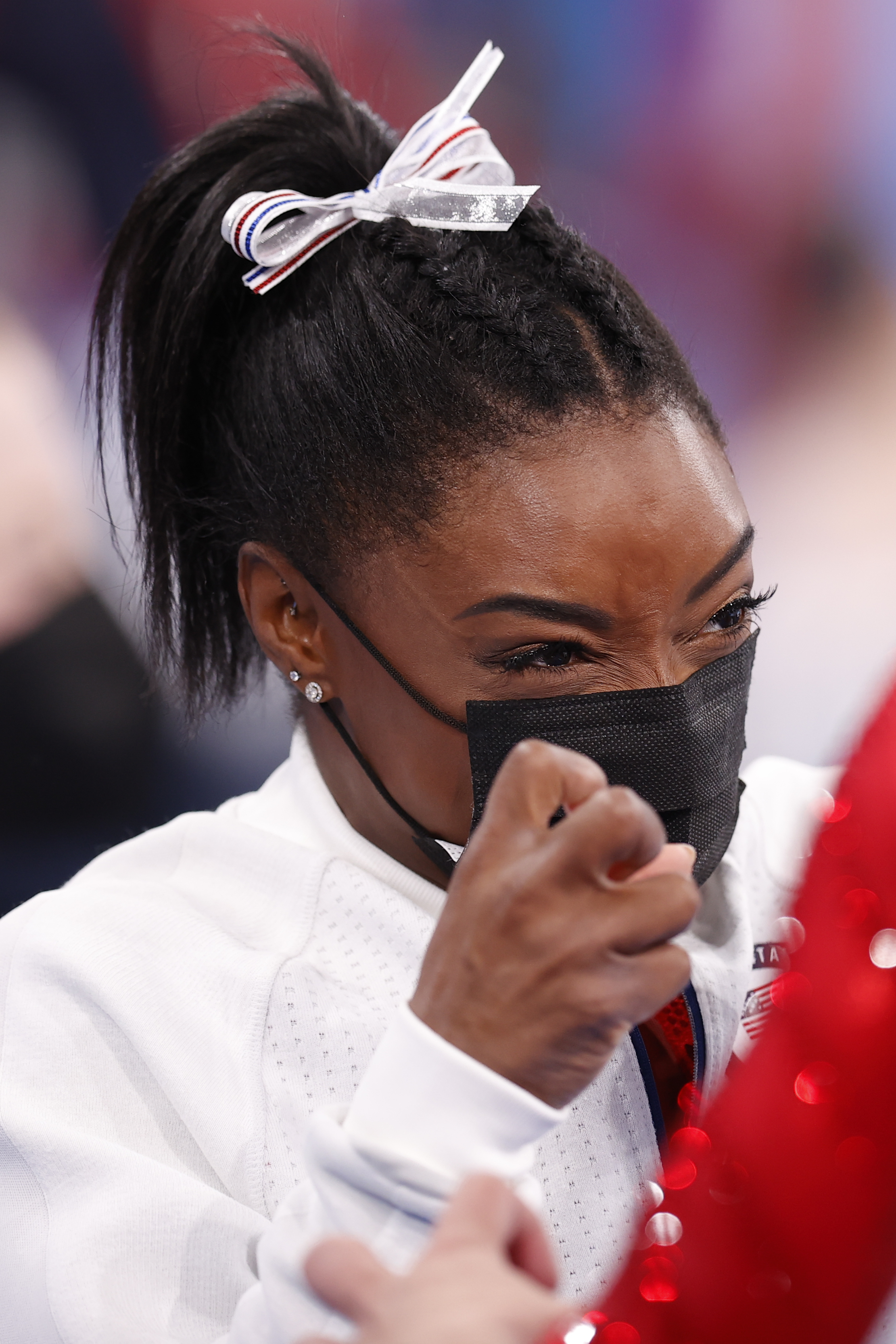 Simone Biles reacts during the Women's Team Final at the Tokyo 2020 Olympics on July 27, 2021 | Source: Getty Images