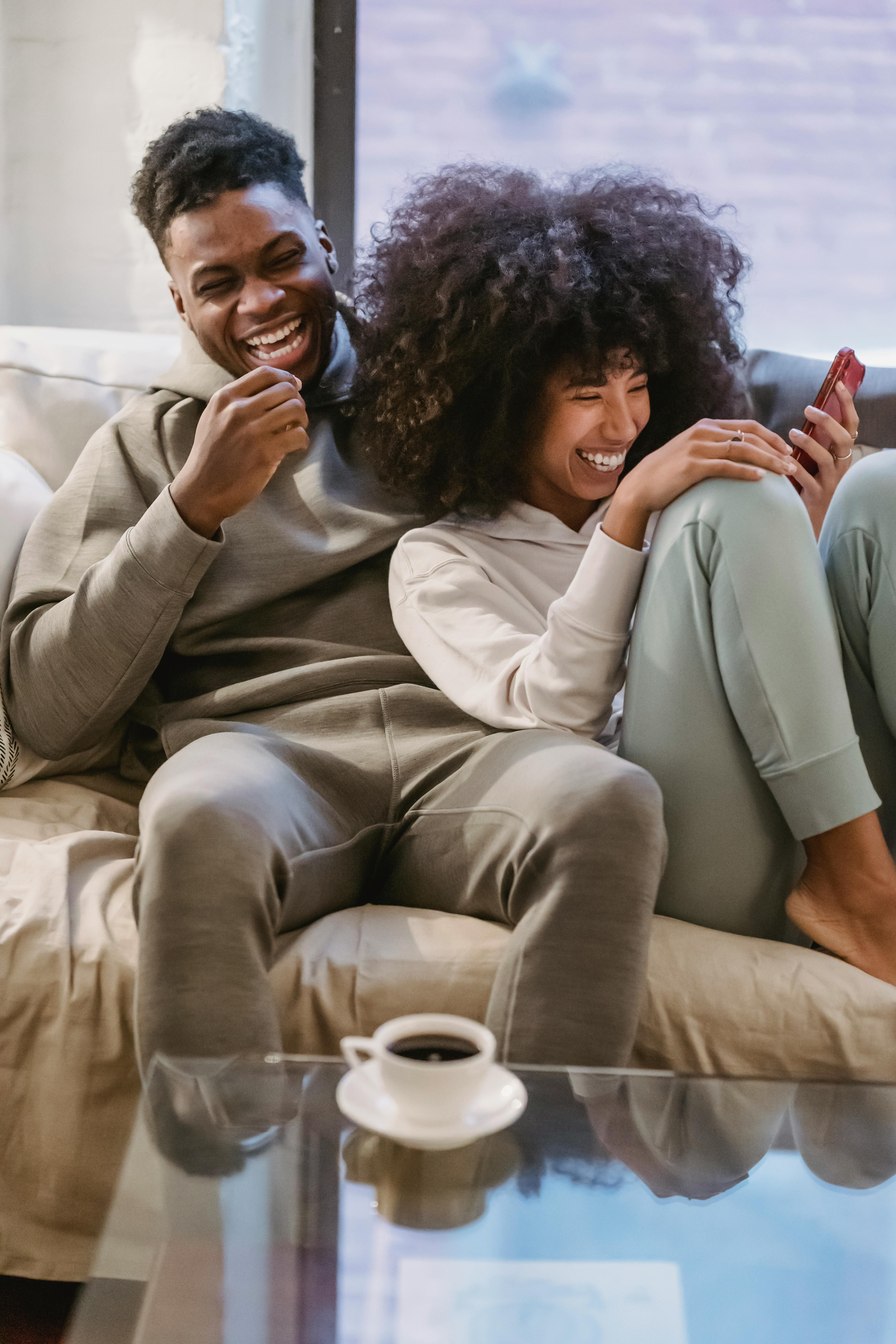 A happy black couple at home | Source: Pexels