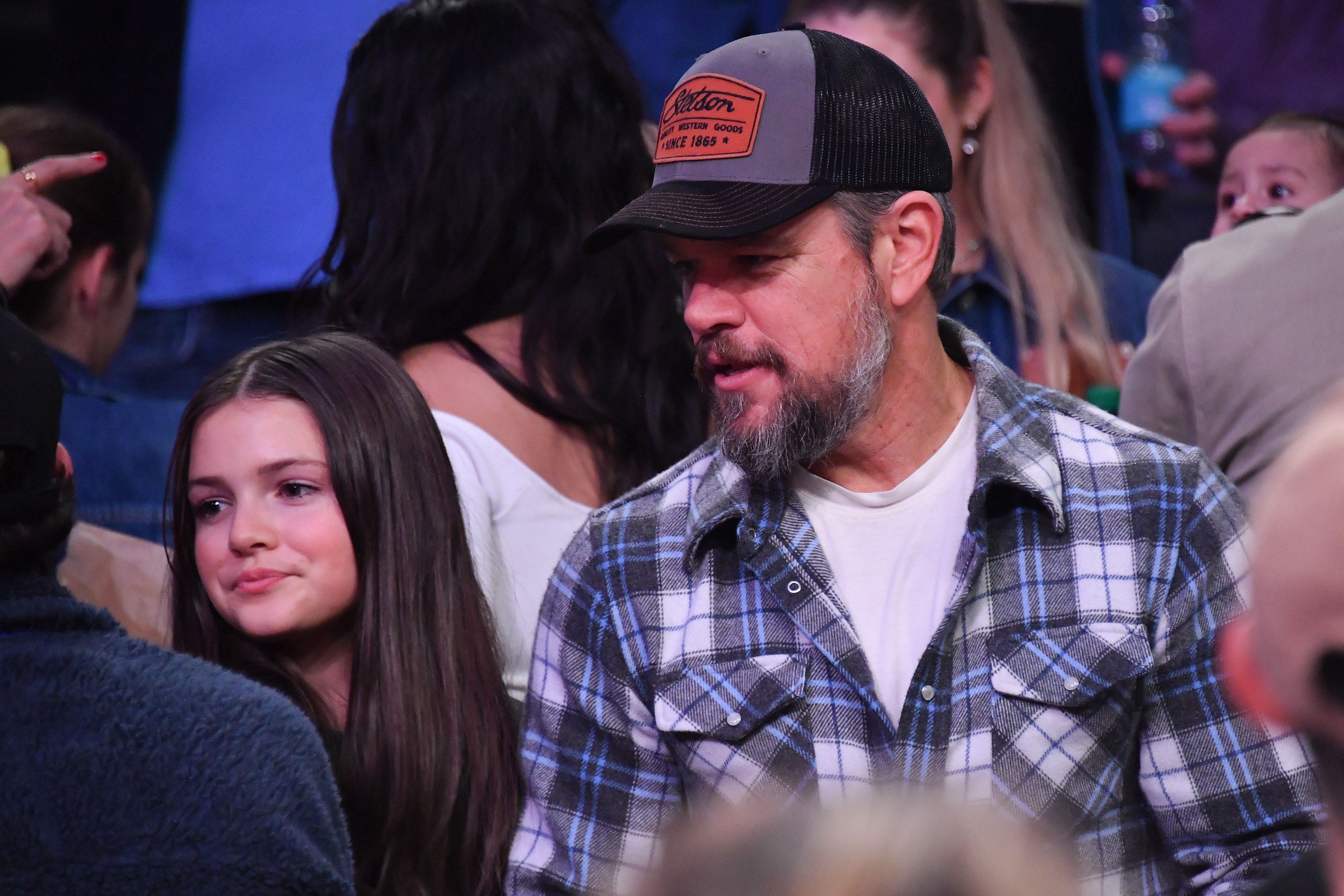 Matt Damon and daughter Stella Damon are seen together during a basketball game, one of the actor's rare public appearances with his children. | Source: Getty Images