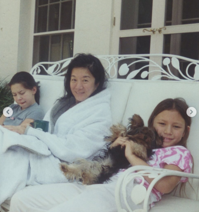 The designer cherished the memories of her children growing up and frequently shared nostalgic glimpses of their shared childhood moments. In this photo, she posed with her daughters on a porch sofa alongside their dog during a throwback moment uploaded on May 11, 2025. | Source: Instagram/verawang