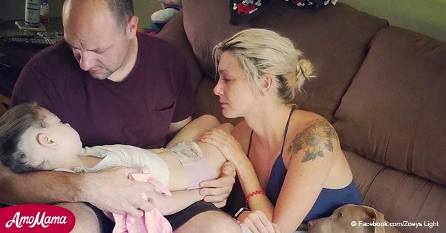 Heartbroken parents share daughter's final moments in emotional photo