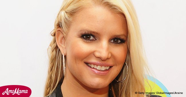 Jessica Simpson shows off possible baby bump in racy mini dress