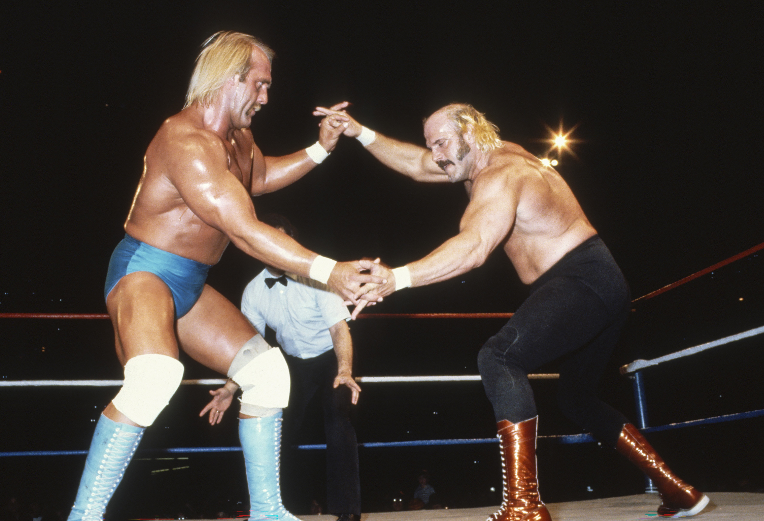Hulk Hogan and Jesse Ventura in action during a WWE event in 1980. | Source: Getty Images