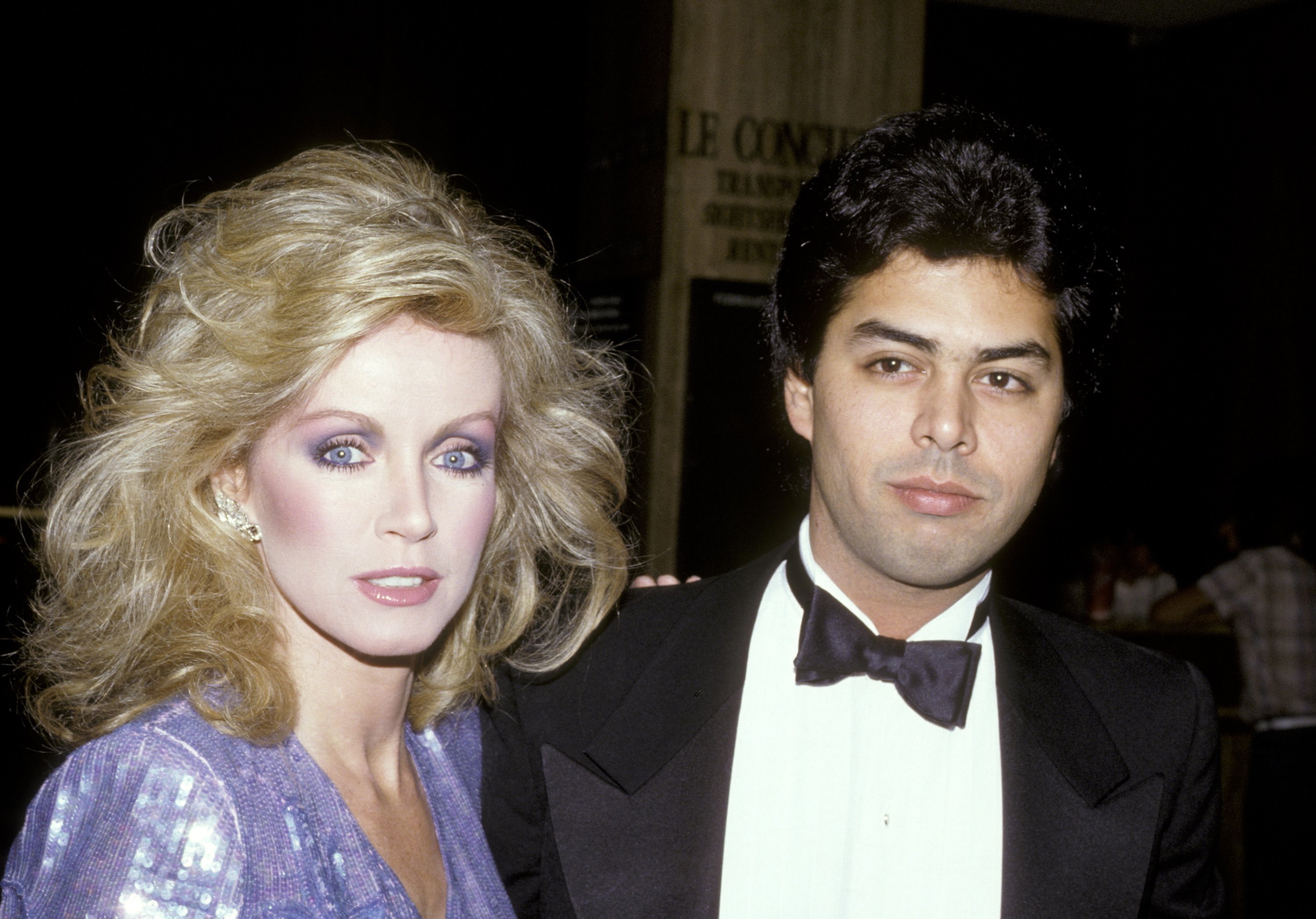 Donna Mills and Richard Holland at a Valentine's Day Party at Chasen's Restaurant in Beverly Hills, California, on February 13, 1983 | Source: Getty Images