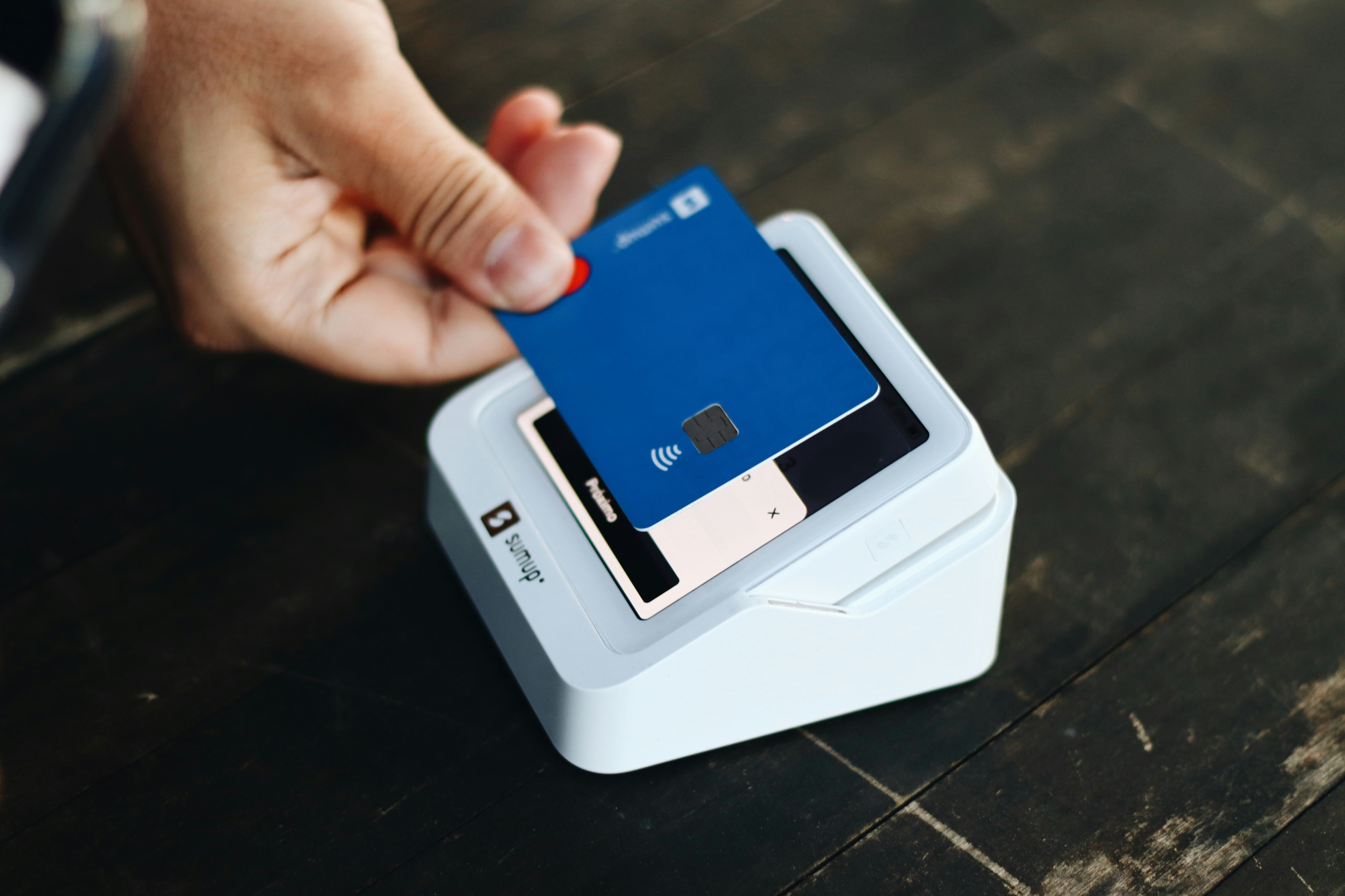 A person tapping their card | Source: Unsplash