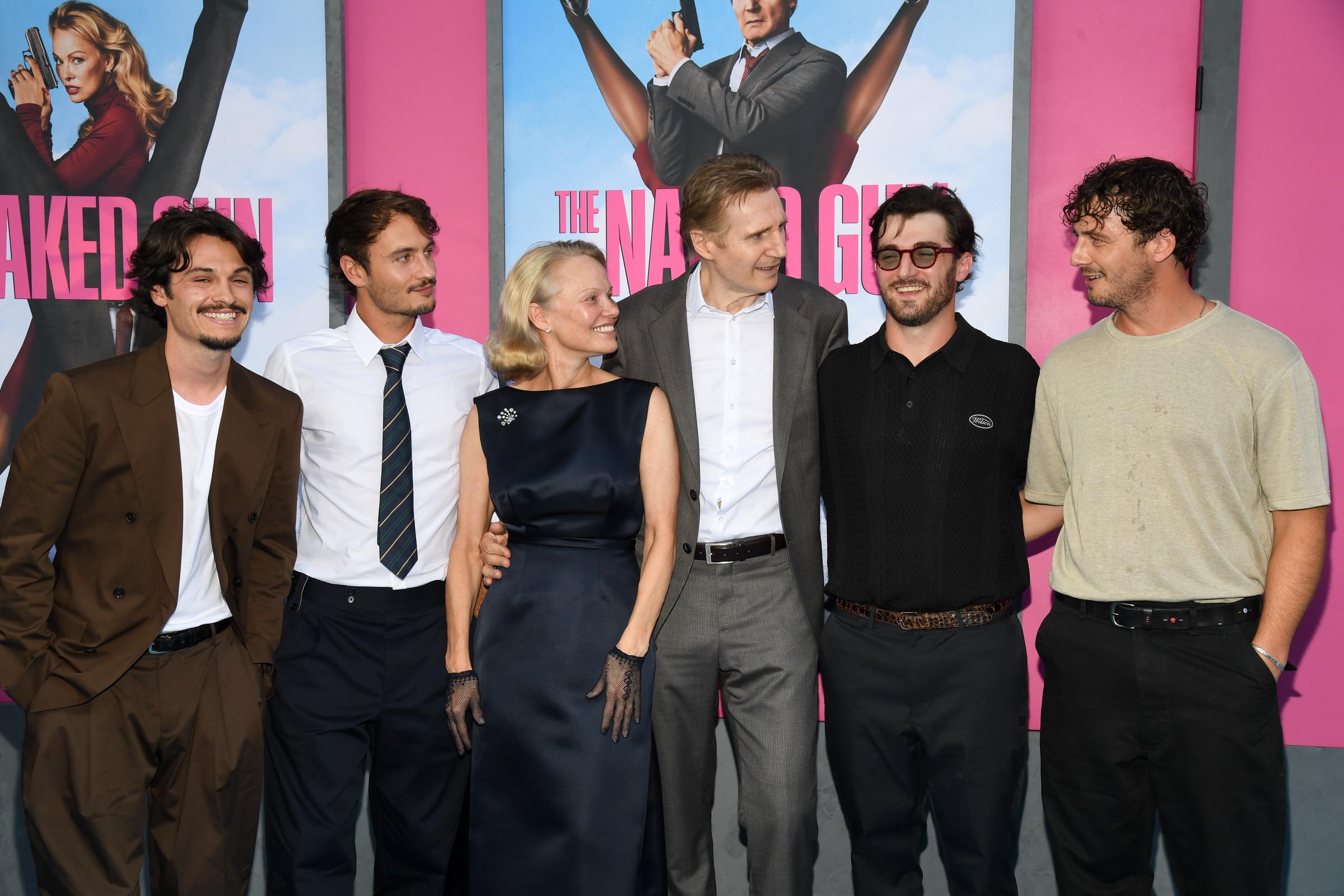 Dylan Jagger Lee, Brandon Thomas Lee, Pamela Anderson, Liam Neeson, Daniel Neeson, and Micheál Neeson attend "The Naked Gun" premiere | Source: Getty Images