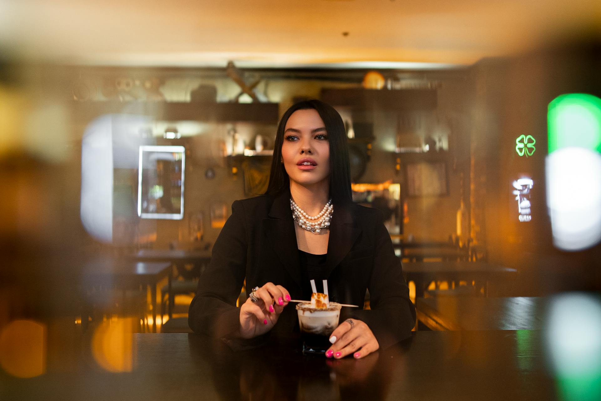 A woman in a bar | Source: Pexels