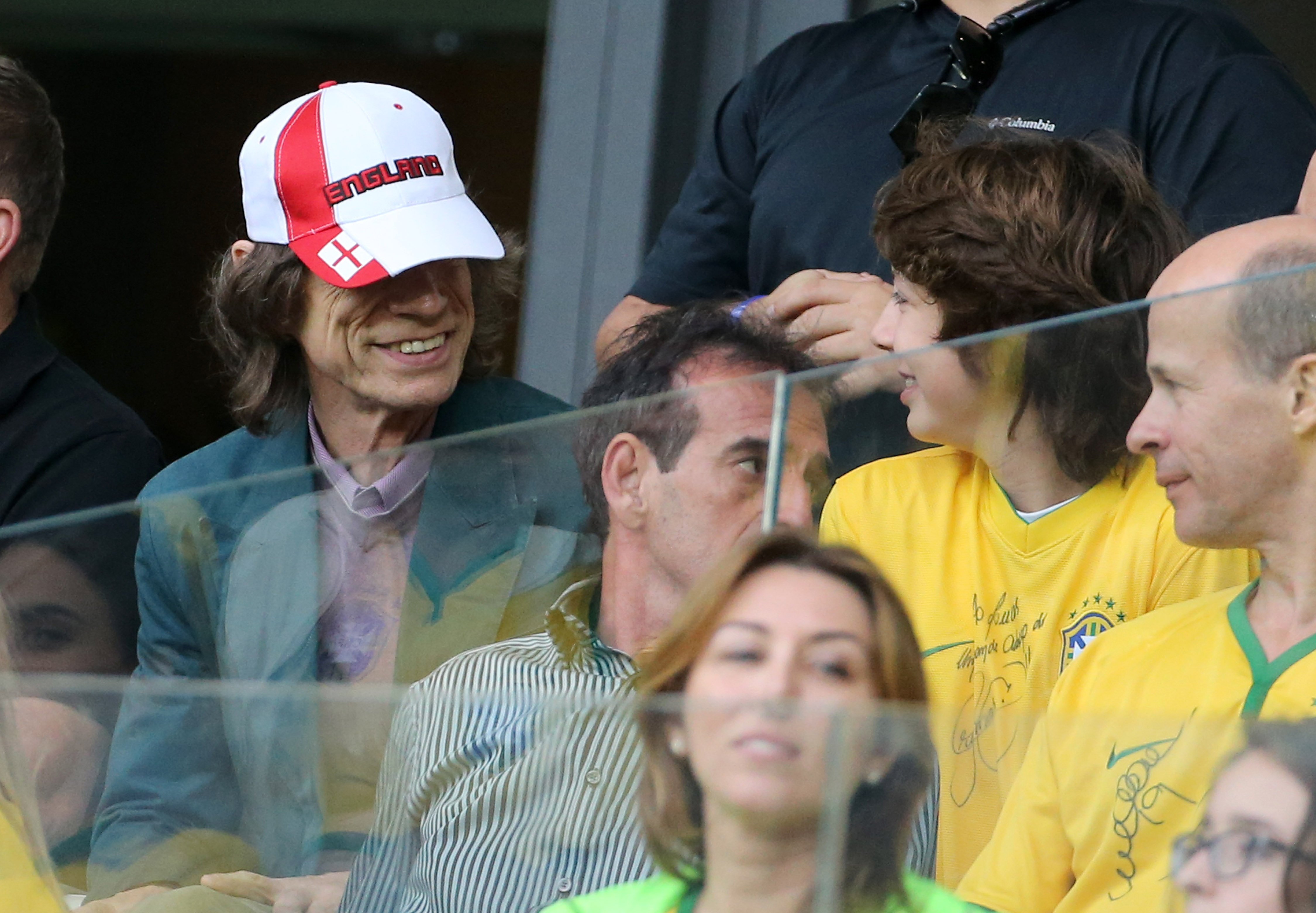 Singer Mick Jagger and his son Lucas Jagger attend the 2014 FIFA World Cup Brazil Semi Final match at Estadio Mineirao on July 8, 2014 in Belo Horizonte, Brazil ┃ Source: Getty Images