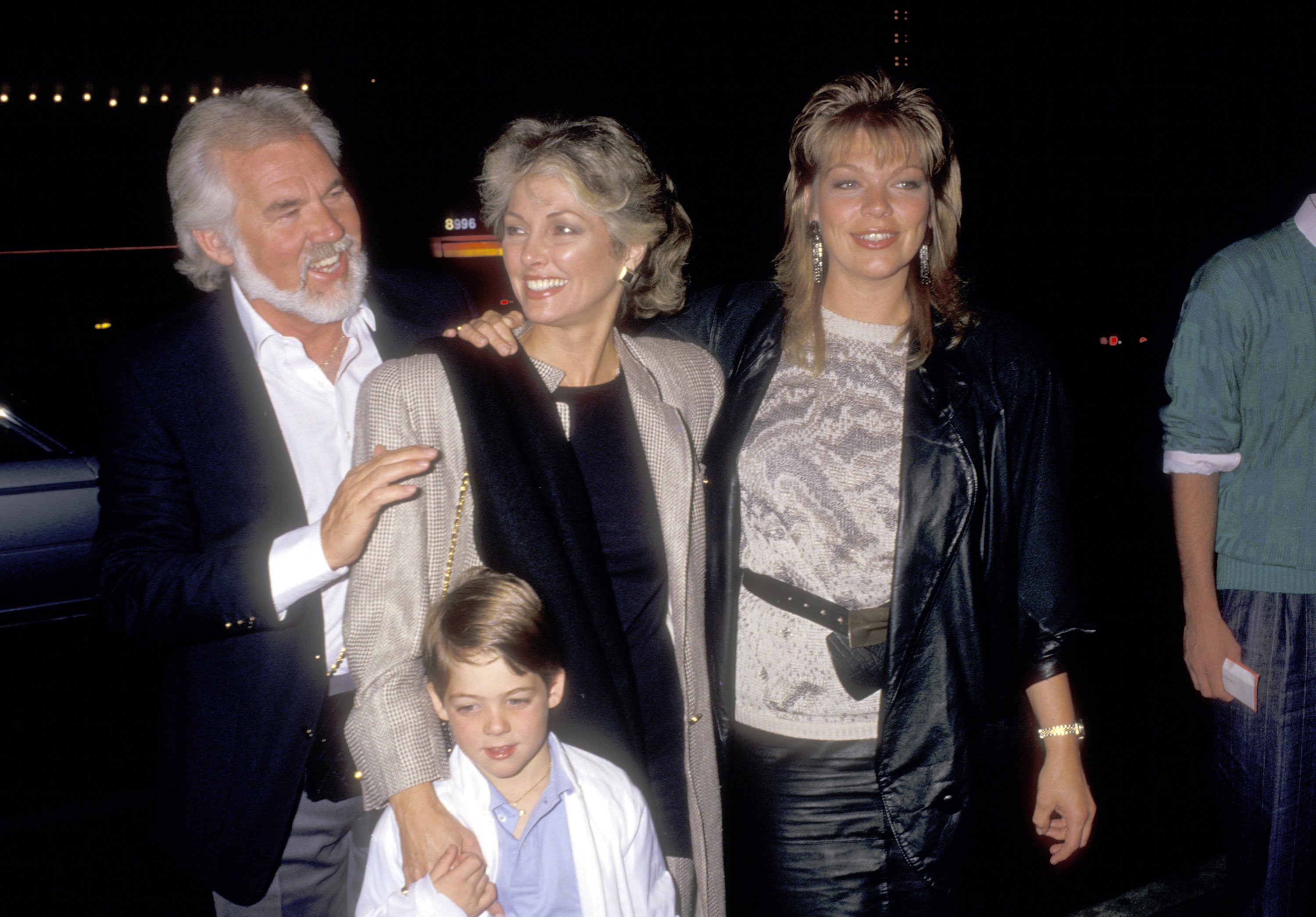 Kenny Rogers is pictured with his ex-wife Marianne Gordon, son Christopher Rogers, and daughter Carole Rogers at the David Copperfield Magic Show on May 15, 1987, at Pantages Theatre in Hollywood, California | Source: Getty Images