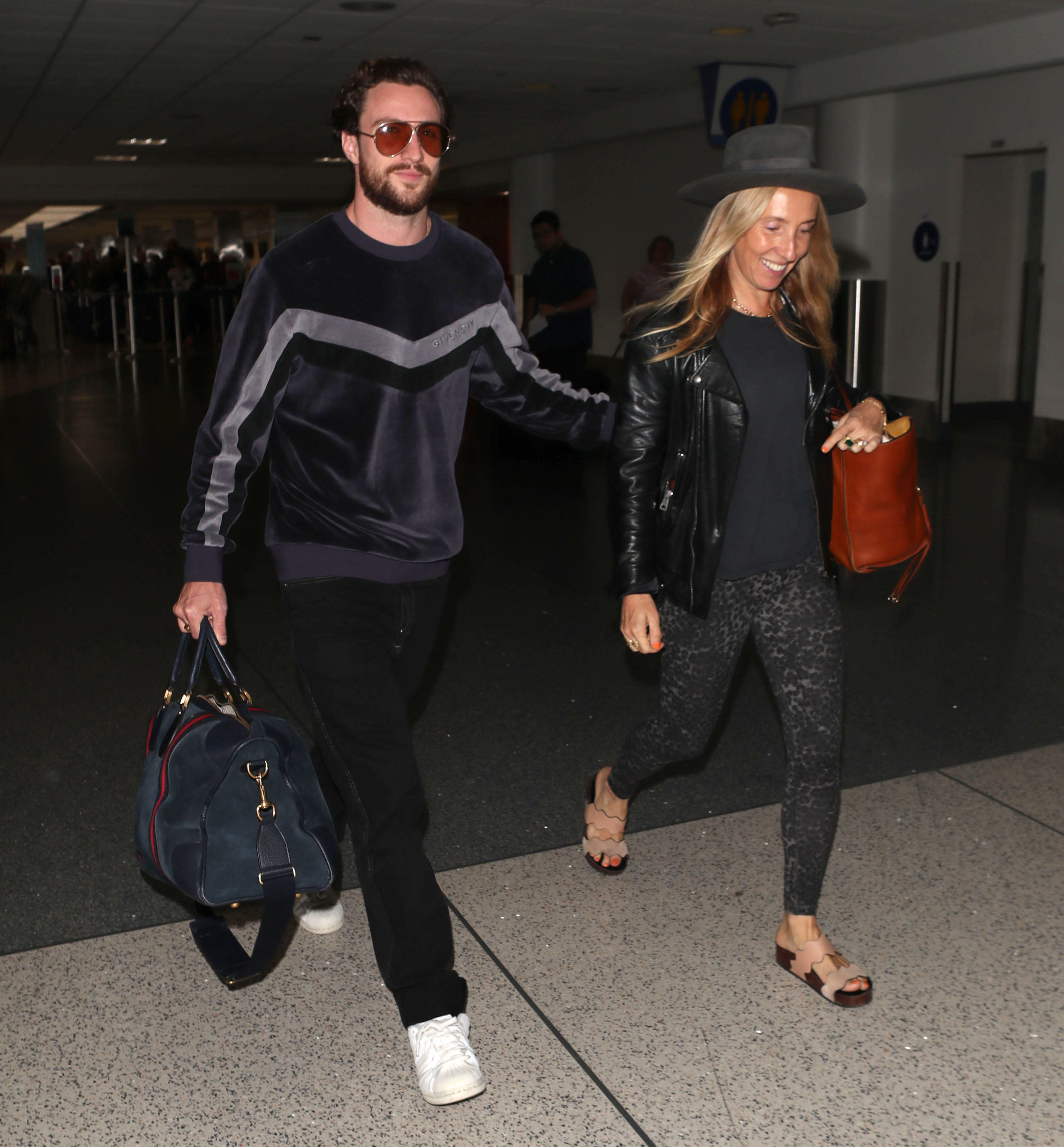 Aaron Taylor-Johnson and Sam Taylor-Johnson at LAX in 2018 | Source: Getty images