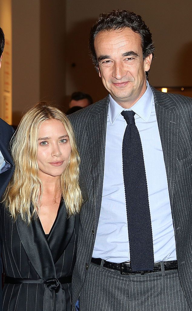 Mary-Kate Olsen and Olivier Sarkozy attend 2013 "Take Home A Nude" Benefit Art Auction And Party at Sotheby's on October 8, 2013 in New York City. | Source: Getty Images
