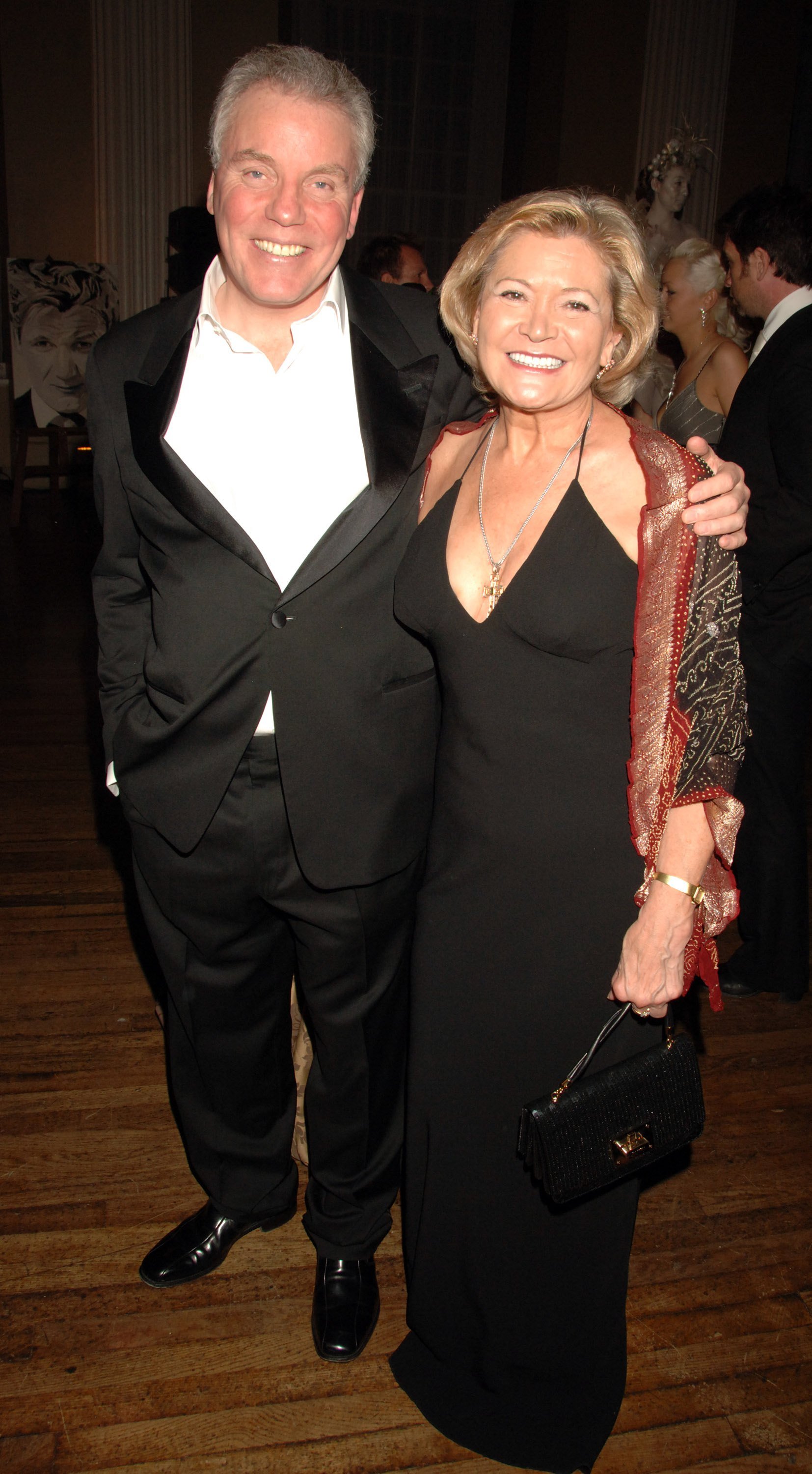 Chris Hutcheson (L) and wife Greta attend celebrity chef Gordon Ramsay's 40th Birthday Party at the Banqueting House in Whitehall Place on November 11, 2006 in London, England. | Source: Getty Images