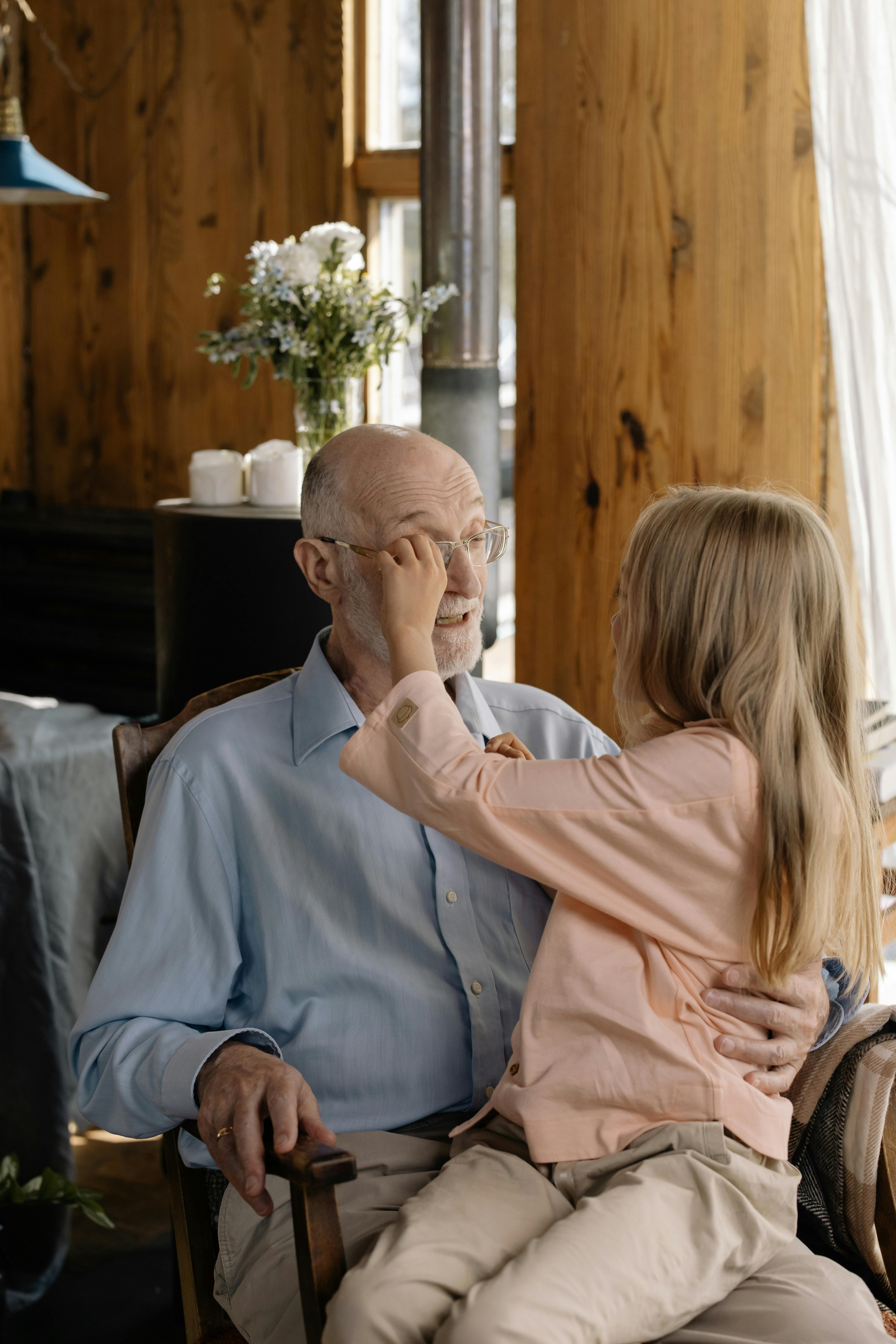 A grandfather and granddaughter | Source: Pexels