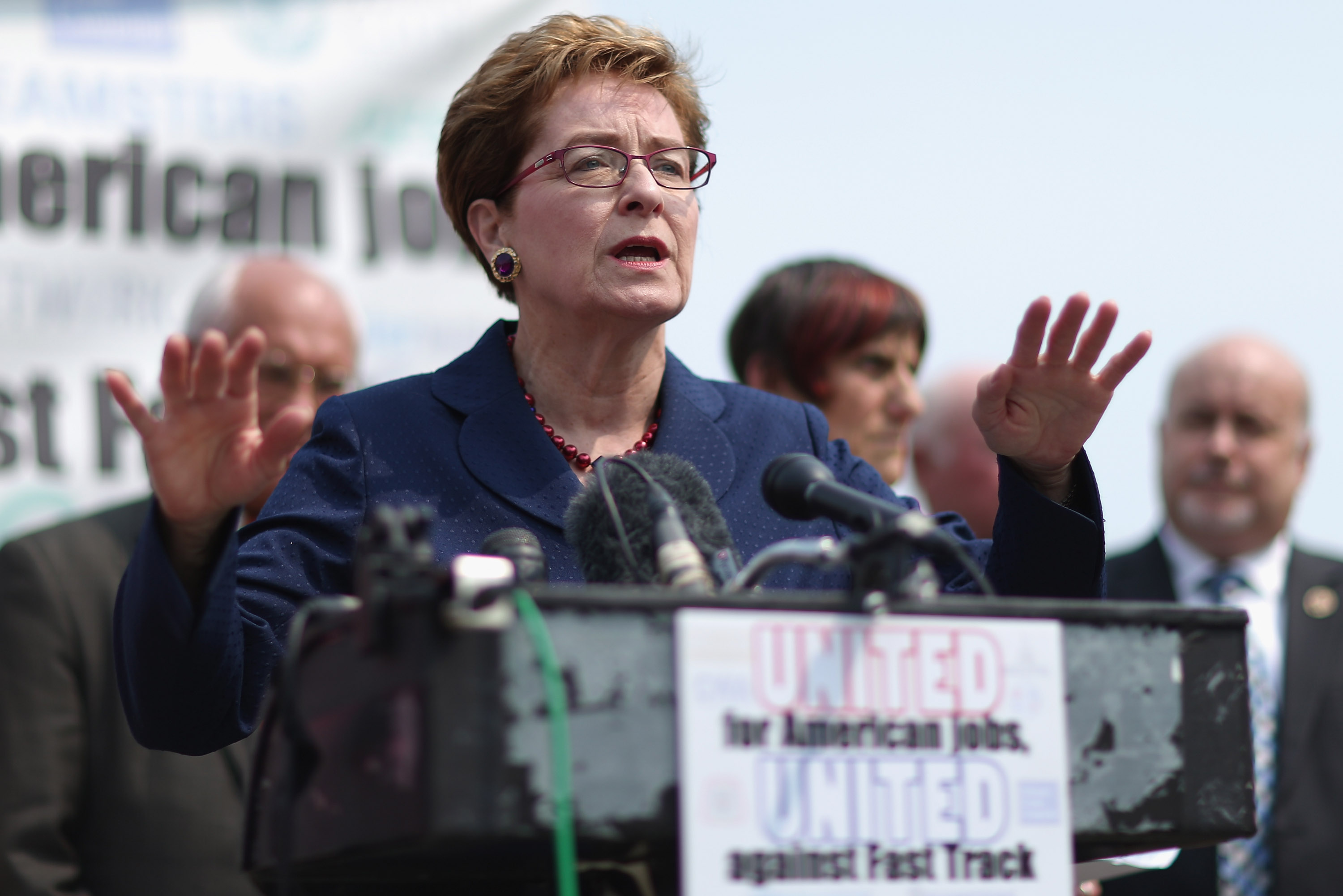 Kaptur passionately addressing an outdoor crowd, showcasing the high-energy fighting spirit her team promises she will bring right back to office after recovering. | Source: Getty Images