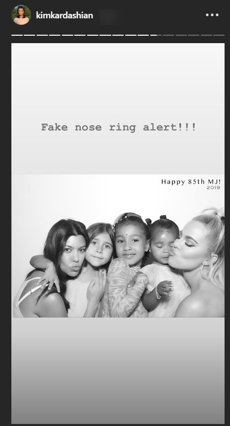 North West posing with aunts Kourtney and Khloé Kardashian and her cousins for Mary Jo Campbell's birthday | Photo: Instagram Story/Kim Kardashian