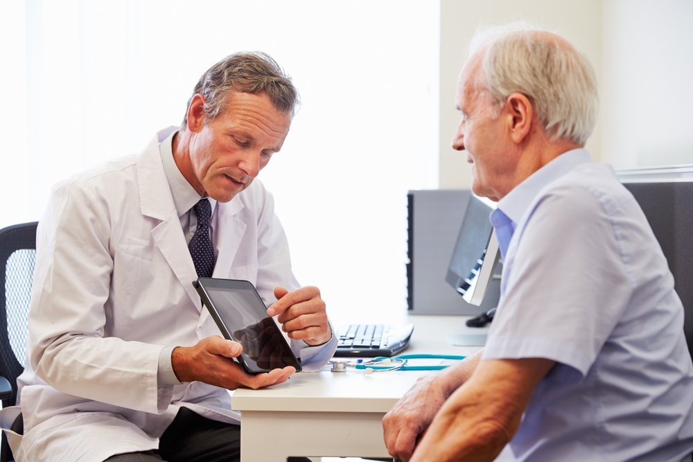 Un patient consultant son docteur. | Shutterstock Un patient consultant son docteur. | Shutterstock