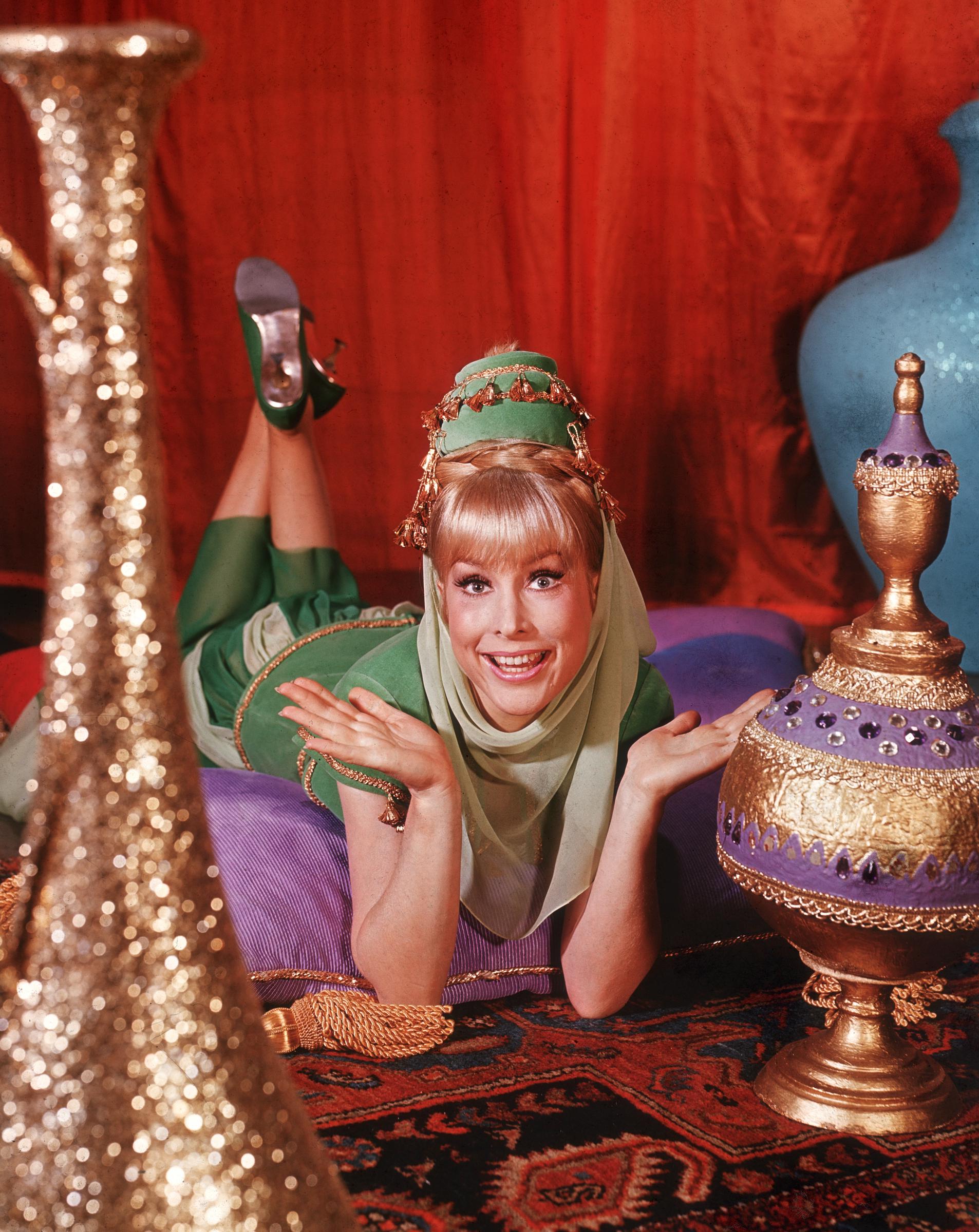 Barbara Eden is dressed in a green genie costume for the television series, "I Dream of Jeannie." | Source: Getty Images