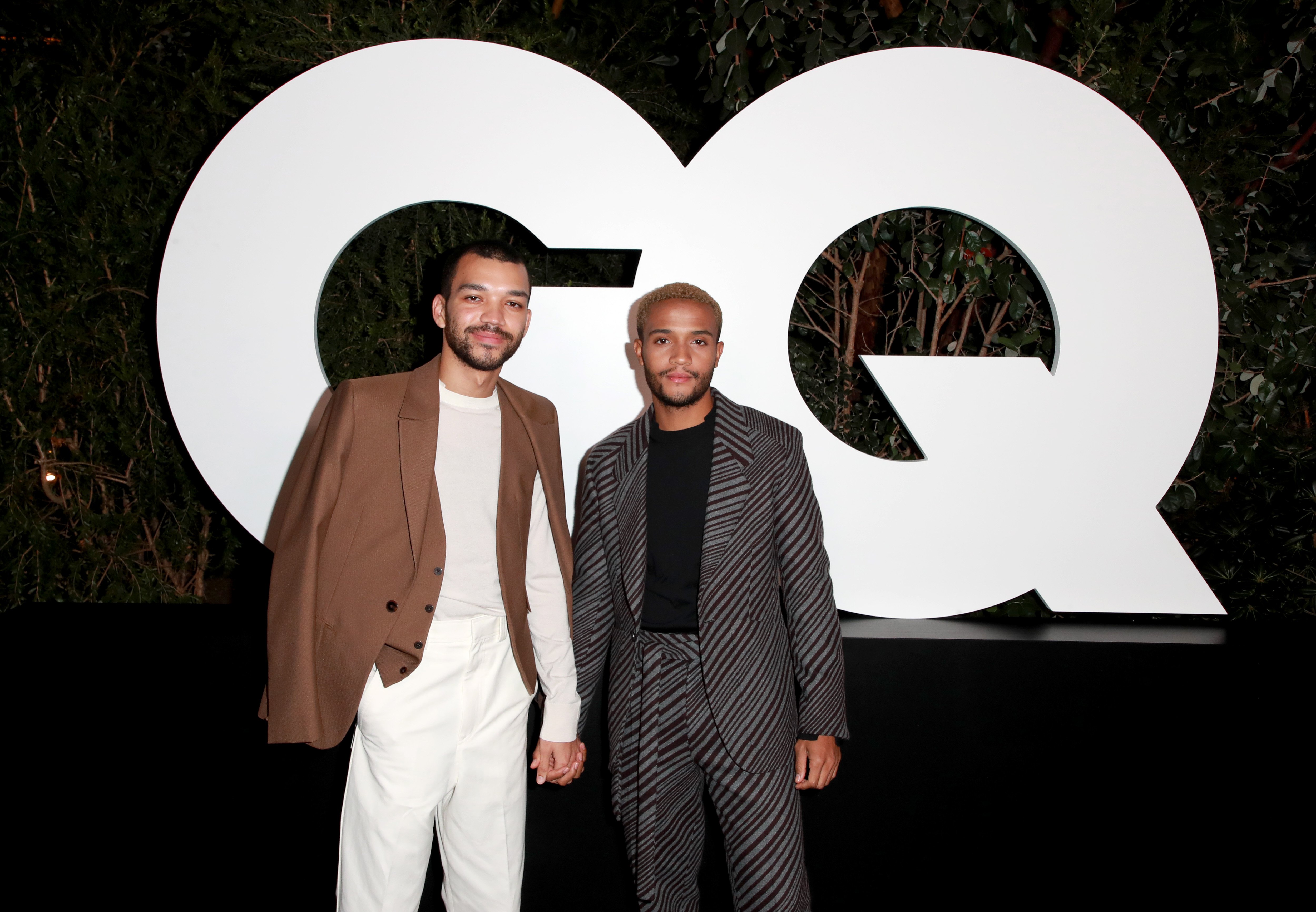 Justice Smith and Nicholas Ashe attend the 2021 GQ Men of the Year Party at the West Hollywood EDITION on November 18, 2021 in West Hollywood, California | Source: Getty Images