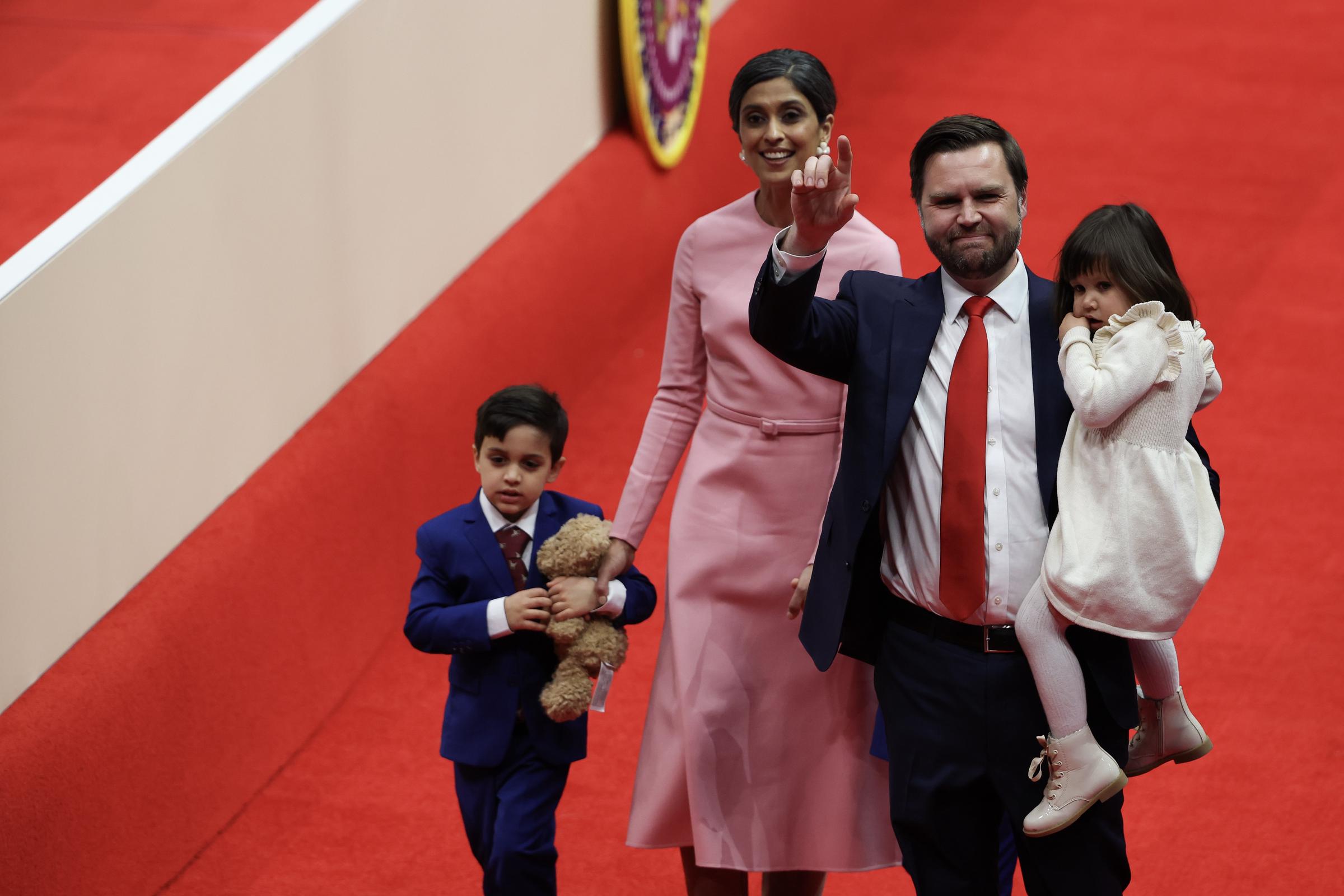 Usha and JD Vance with their children during an indoor inauguration parade at the Capital One Arena on January 20, 2025, in Washington, D.C. | Source: Getty Images