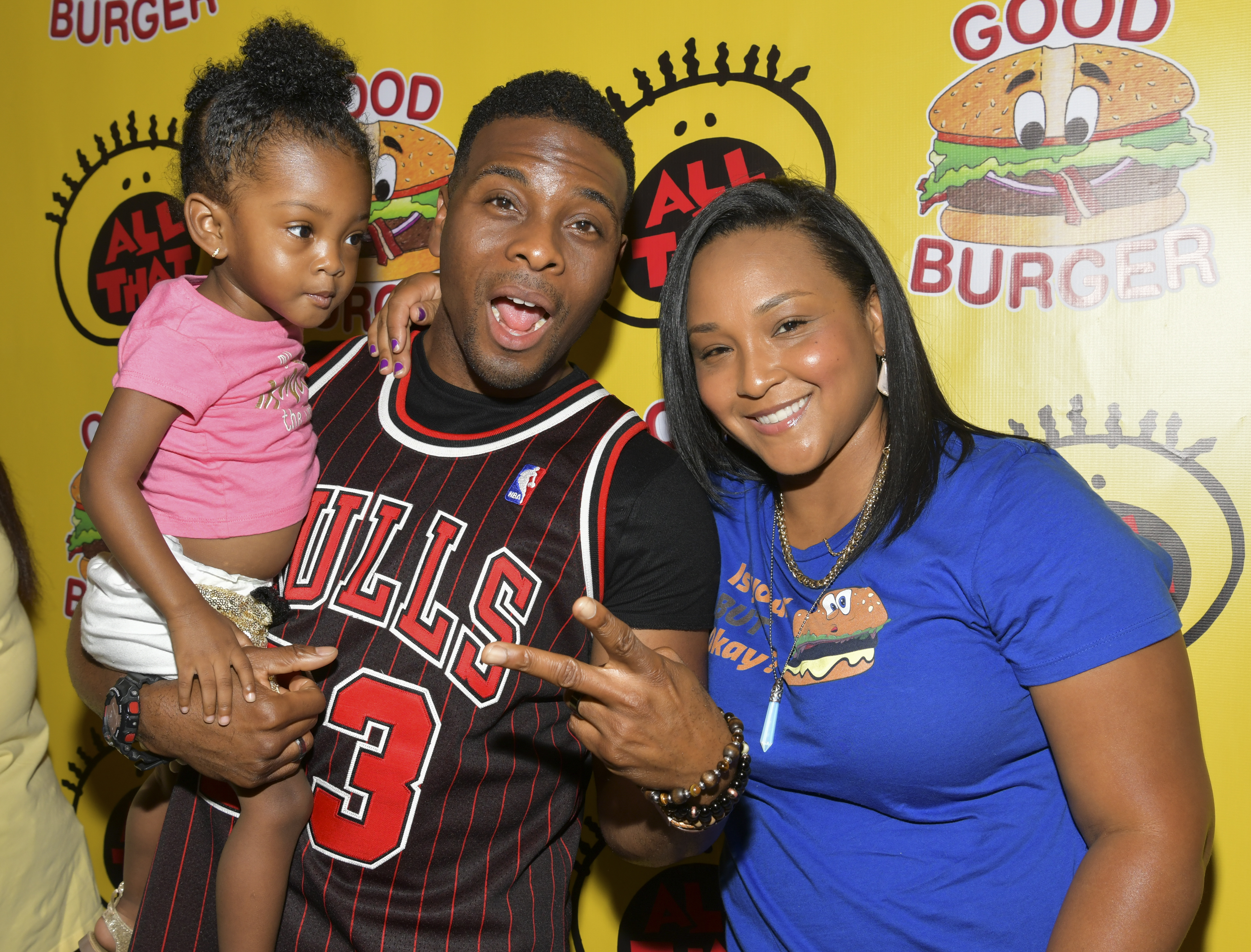Kel Mitchell, Asia Lee, and Wisdom Mitchell at the grand opening party for Nickelodeon's "Good Burger" pop-up diner on July 08, 2019, in West Hollywood, California. | Source: Getty Images