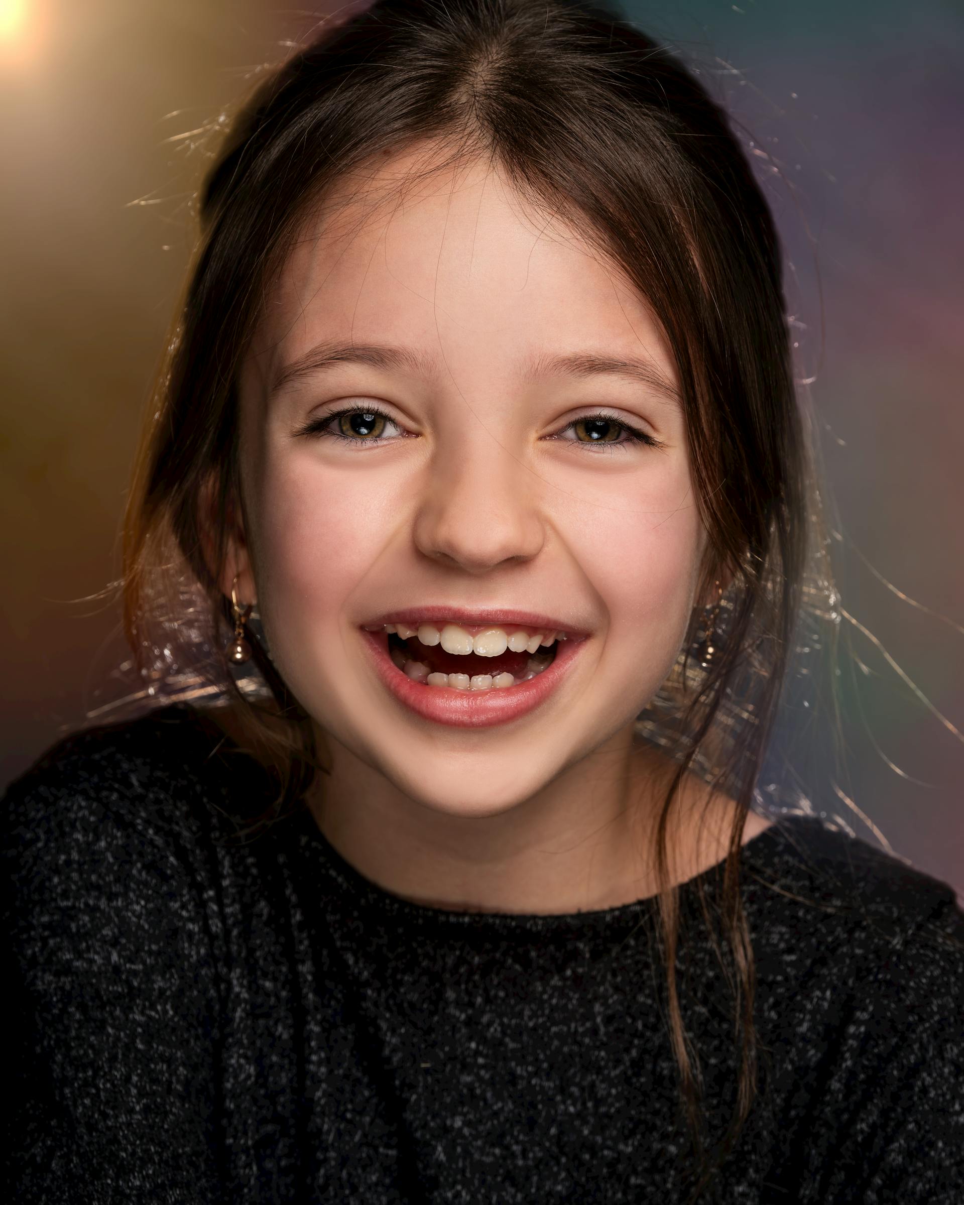 Close-up of a little girl smiling | Source: Pexels