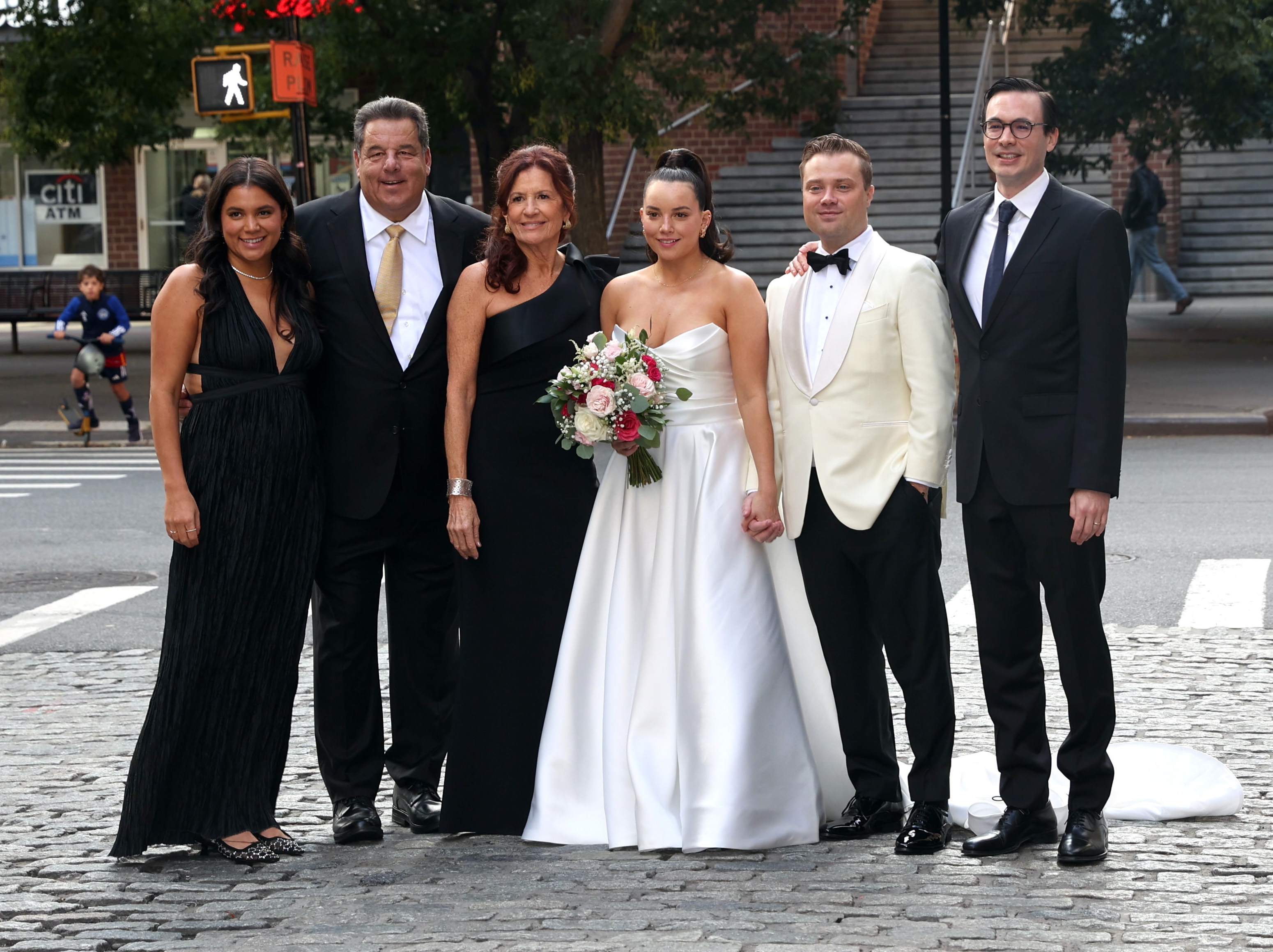 Bria, Steve, Laura, and Ciara Schirripa with Zach Binder and Michael Buccarelli on Ciara and Zach's wedding day in New York City on October 8, 2023 | Source: Getty Images