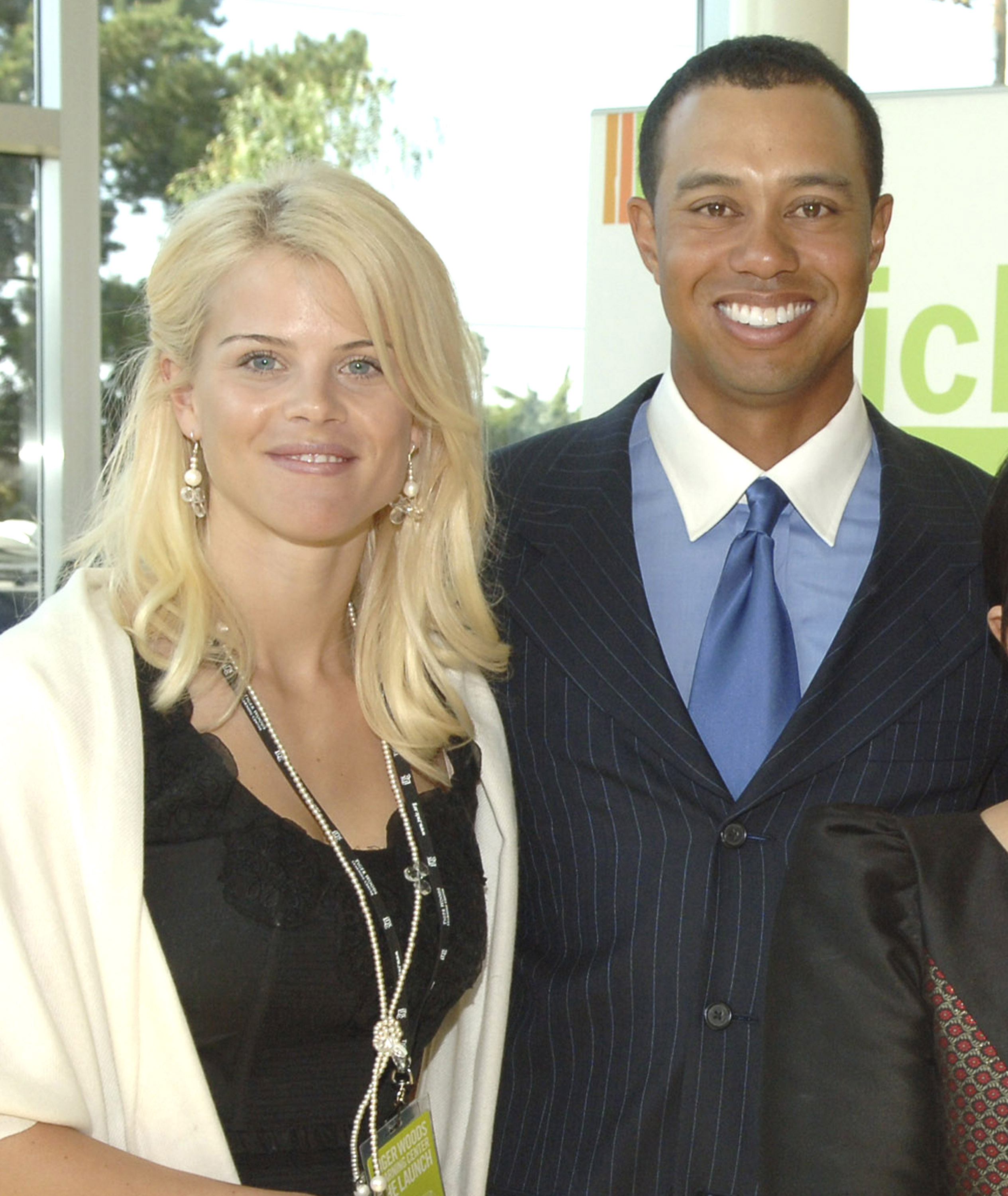 Elin Nordegren and Tiger Woods attend the dedication of the Tiger Woods Learning Center on February 10, 2006. The couple appeared united as Tiger launched his educational foundation.