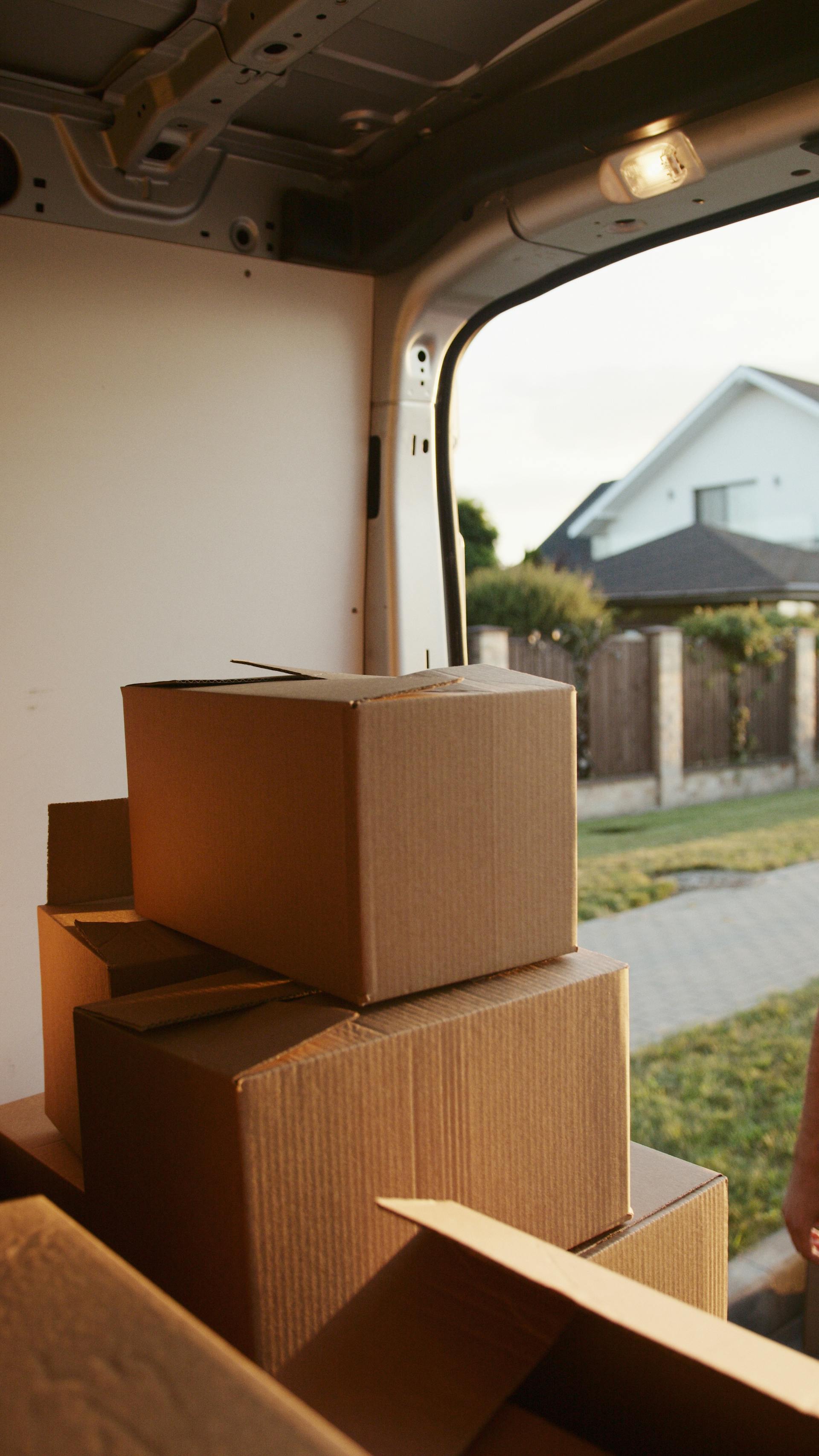 Boxes in the back of a moving van | Source: Pexels