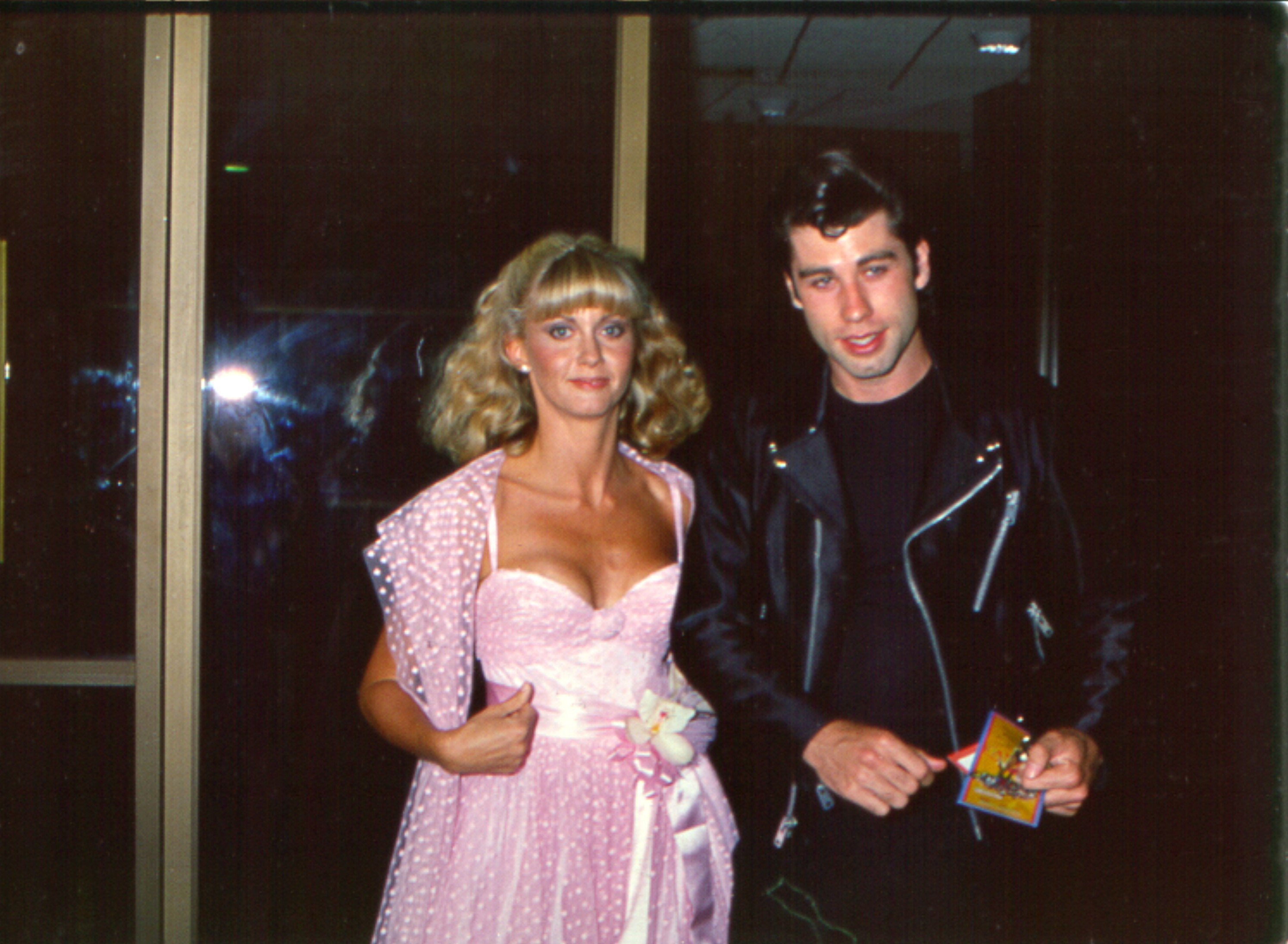 Olivia Newton-John and John Travolta attending the premiere of the musical film "Grease," in 1978. / Source: Getty Images