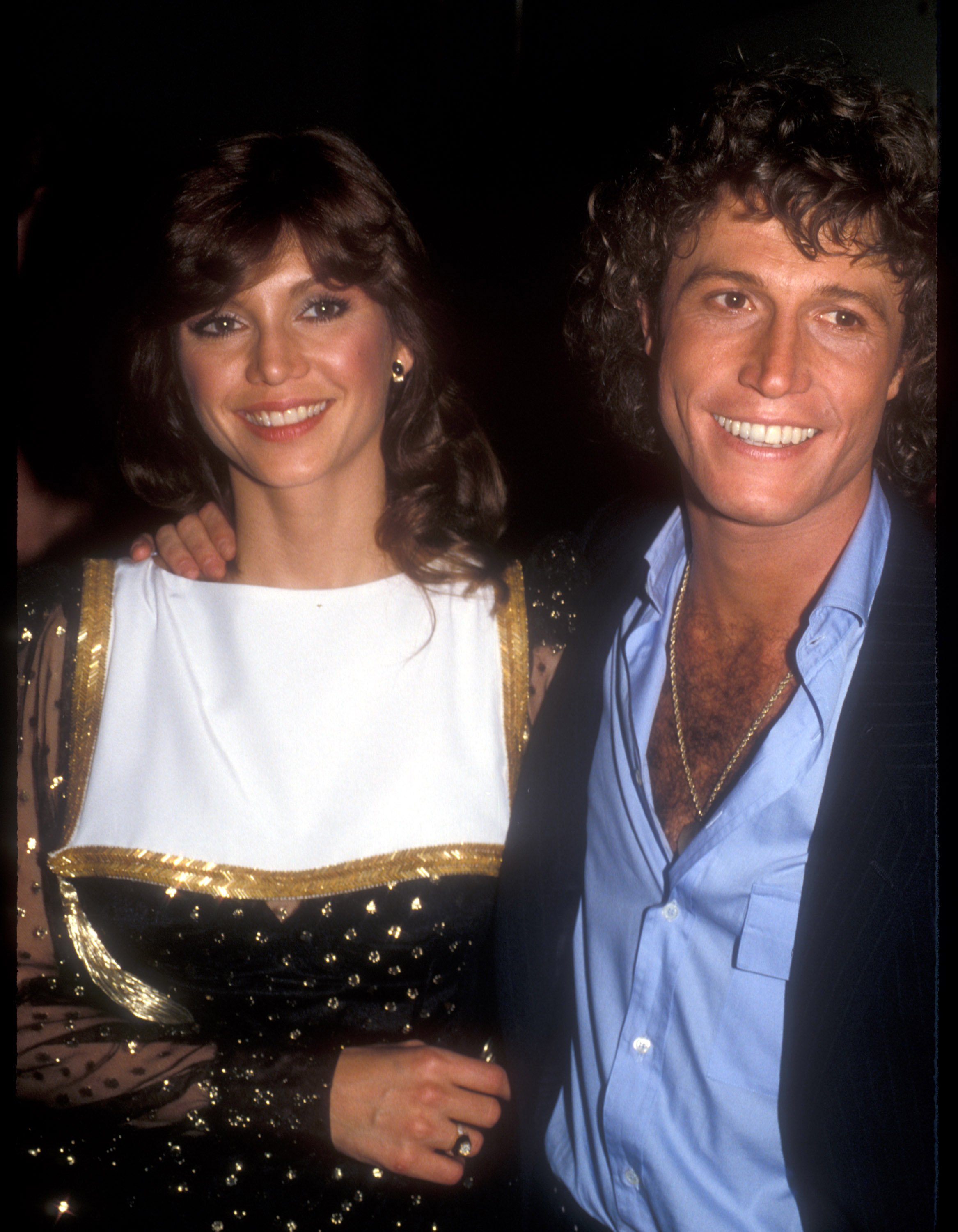 File Photo of Victoria Principal & Andy Gibb at the Pirates of Penzance play opening in Los Angeles, California on June 10, 1981. | Source: Getty Images