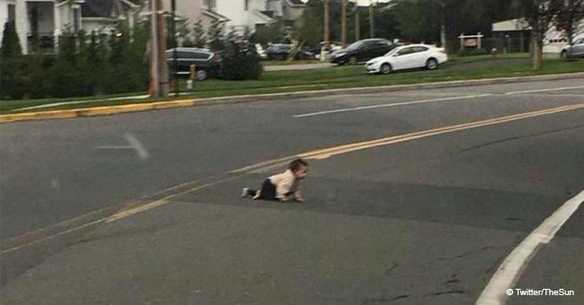 Driver stops his vehicle after witnessing a baby crawling across a busy New Jersey road