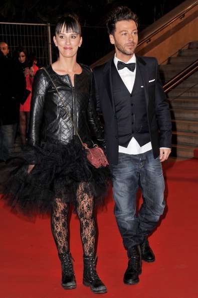 Christophe Mae et Nadège Sarron participent aux NRJ Music Awards 2011 au Palais des Festivals et des Congrès de Cannes, France. | Photo : Getty Images