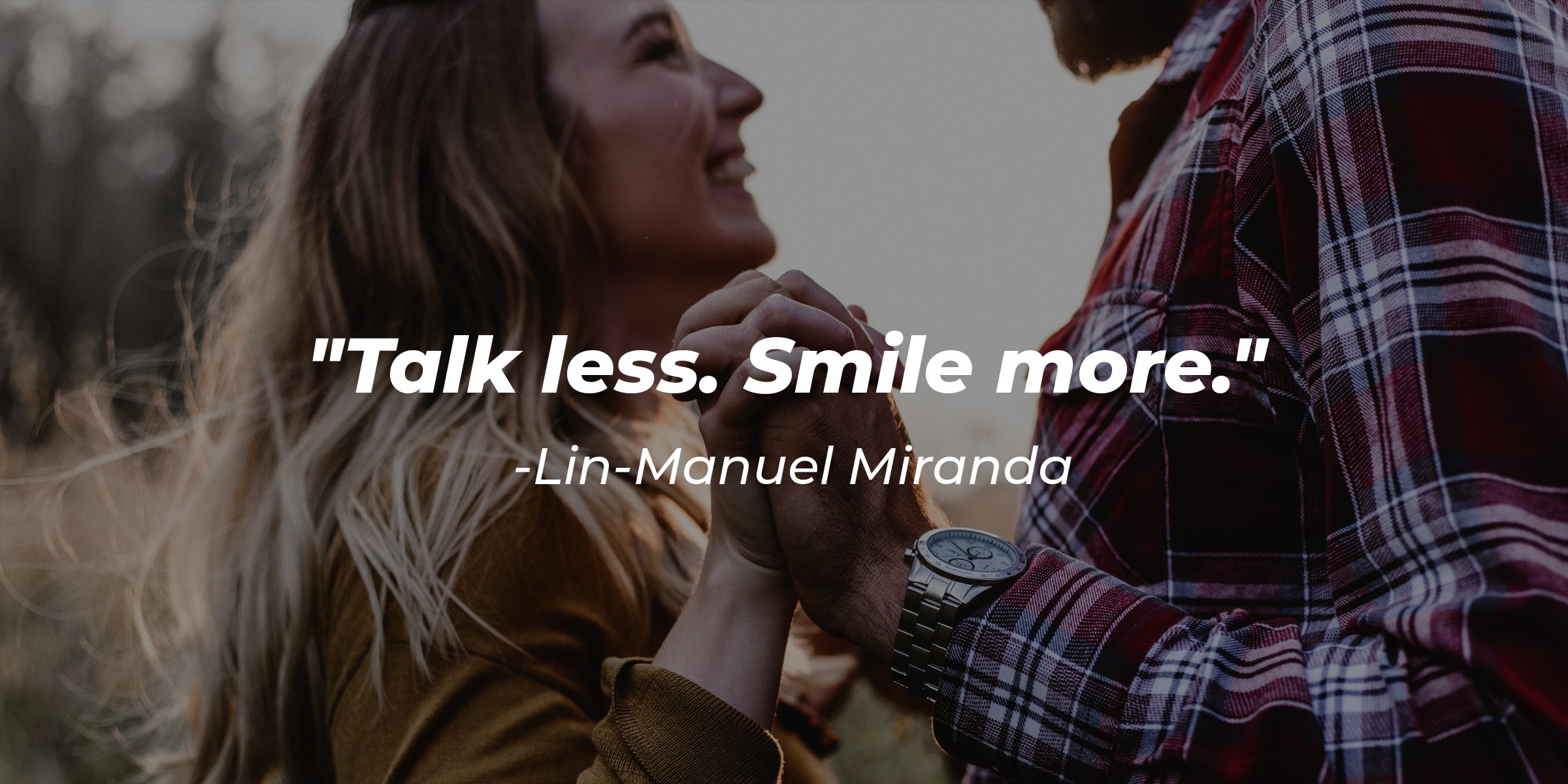 Source: Unsplash | A woman looking up and smiling with Lin-Manuel Miranda's quote: "Talk less. Smile more."