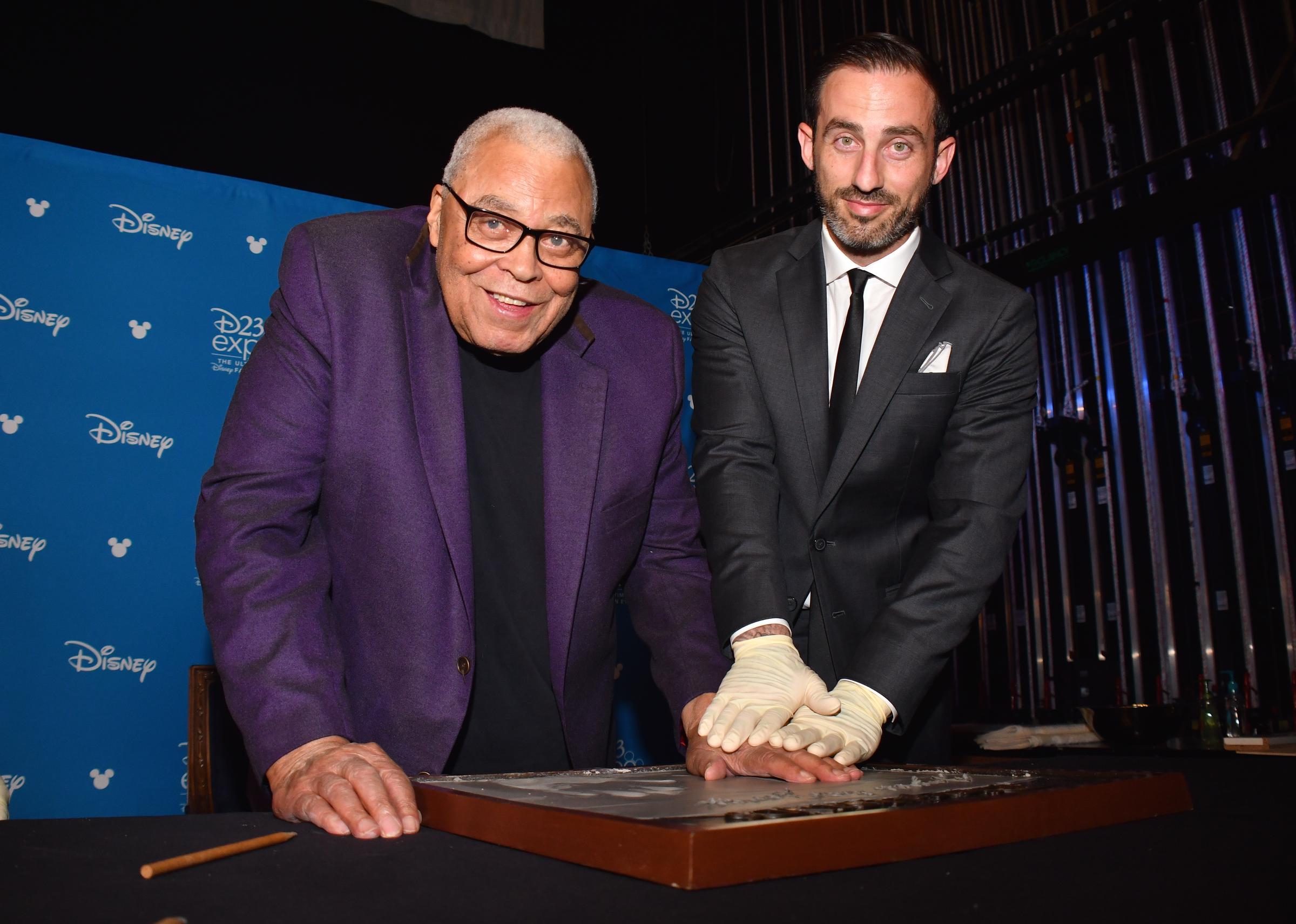 James Earl Jones shown casting his hand in cement for Disney during a special event on July 10, 2019, in Pawling, New York. | Source: Getty Images