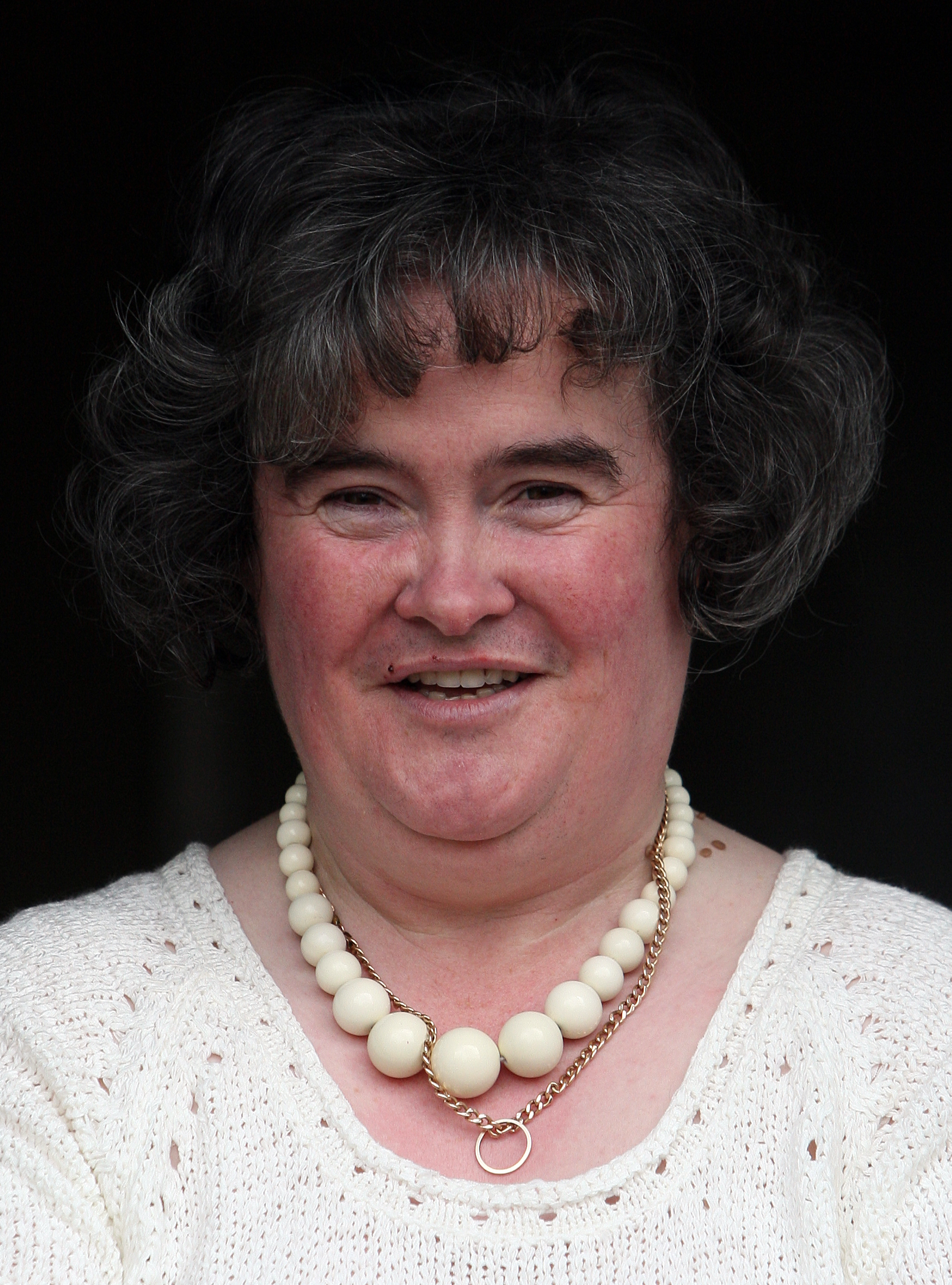 Susan Boyle pictured at her front door on April 16, 2009, in Blackburn, Scotland. | Source: Getty Images