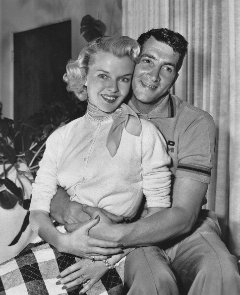 Actor and singer Dean Martin at home with his wife Jeanne Biegger between shoots for "Jumping Jacks" in 1952. | Source: Getty Images