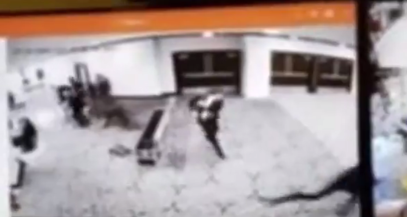 Security footage allegedly showing Cole Allen running between officers at the Washington Hilton on April 25, 2026 | Source: X/BNONews