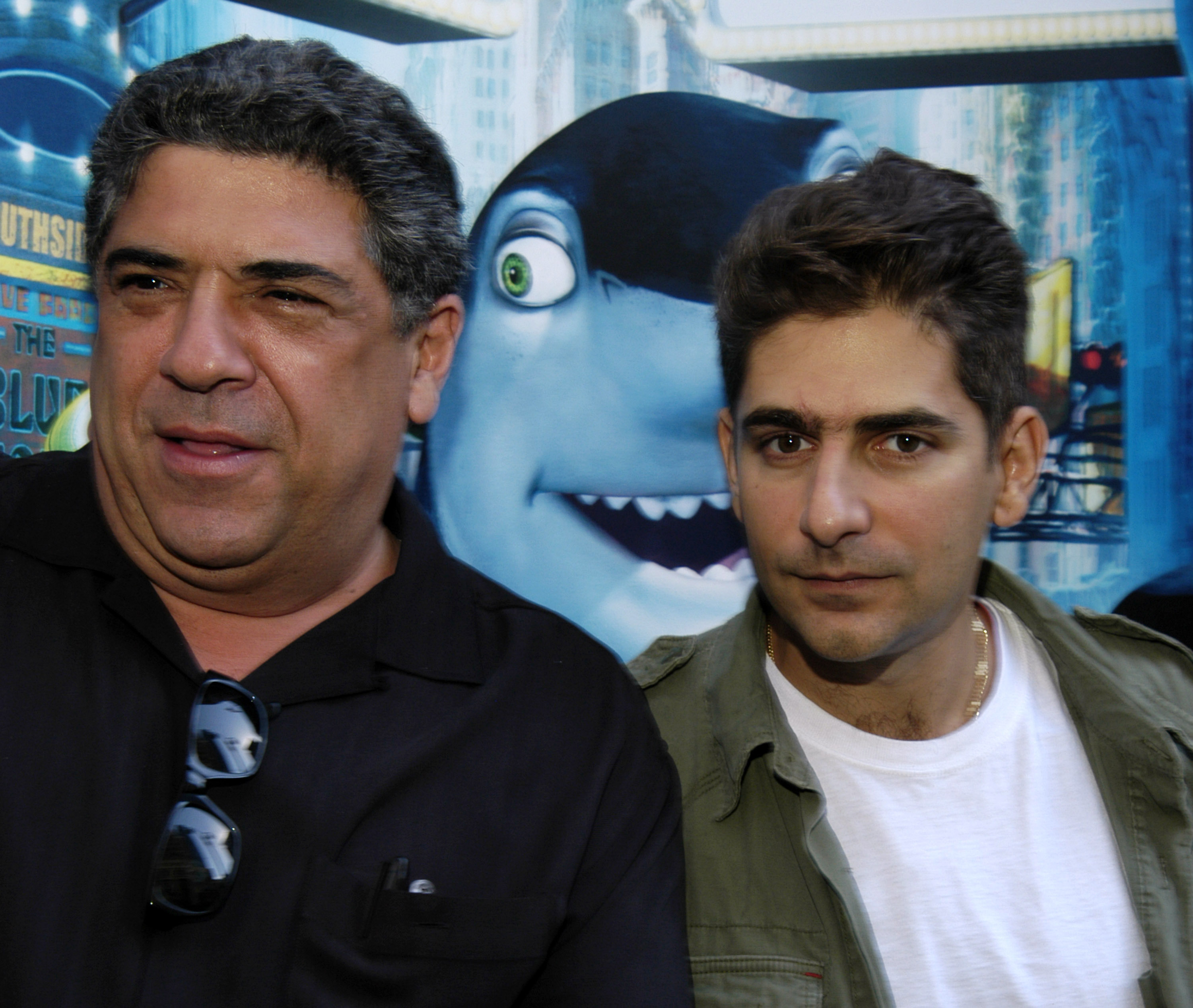 Vincent Pastore poses alongside fellow "The Sopranos" star Michael Imperioli at the premiere of "Shark Tale" in New York, years before Imperioli remembered his longtime co-star as a "beloved friend and collaborator" following Pastore's death. | Source: Getty Images