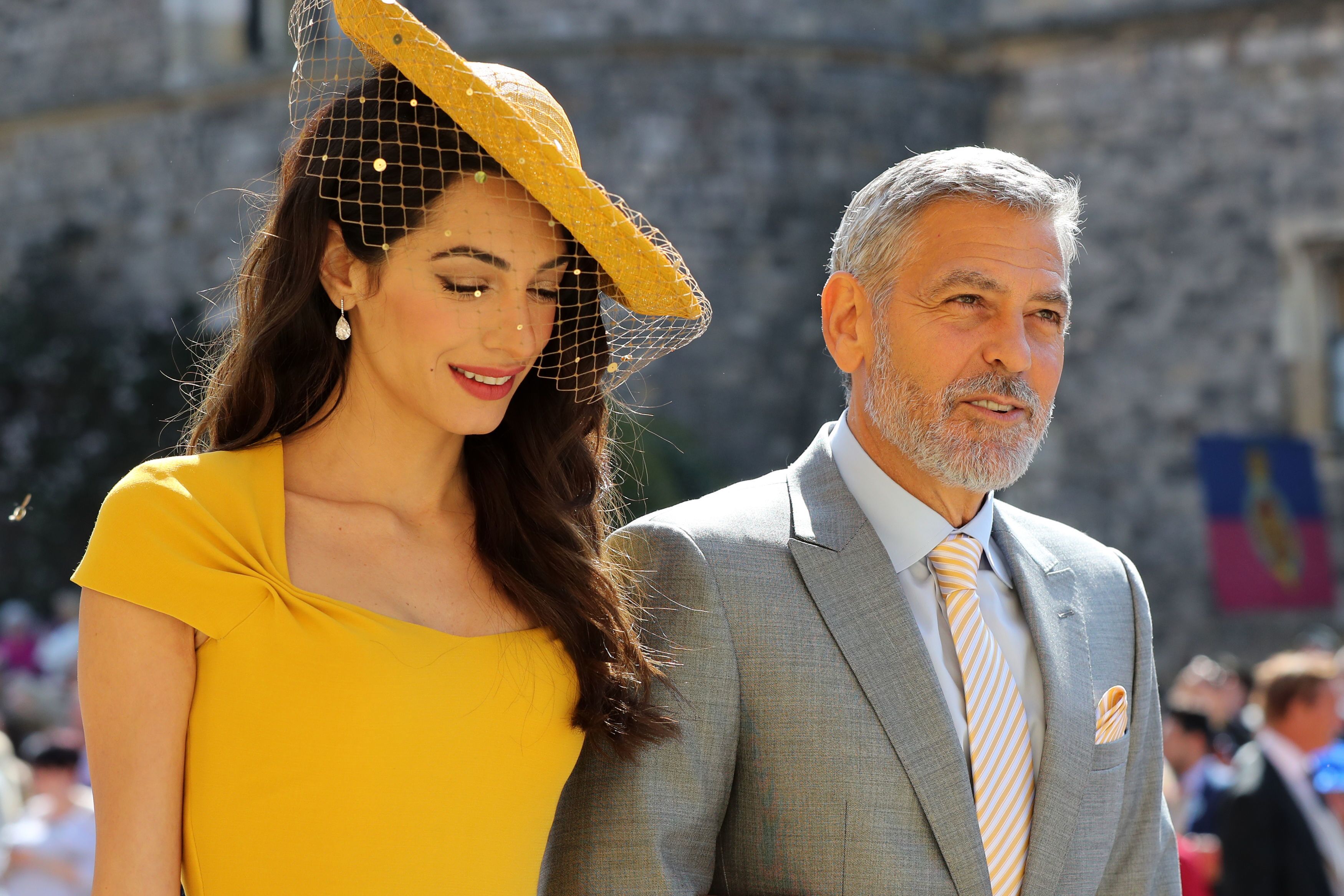 Amal and George Clooney arrive at St George's Chapel at Windsor Castle for the wedding of Prince Harry to Meghan Markle on May 19, 2018 | Source: Getty Images