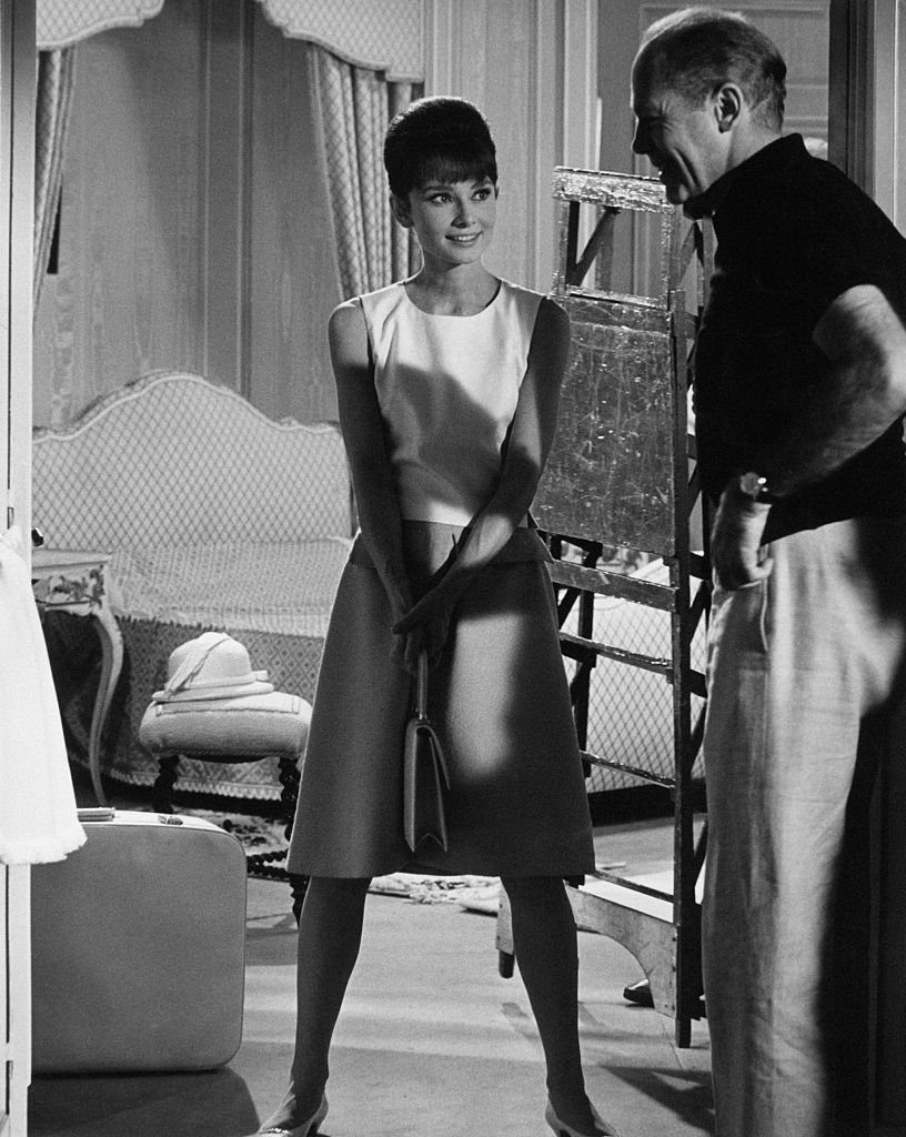 Richard Quine talking to actress Audrey Hepburn on the set of 1964 film "When It Sizzles." | Photo: Getty Images