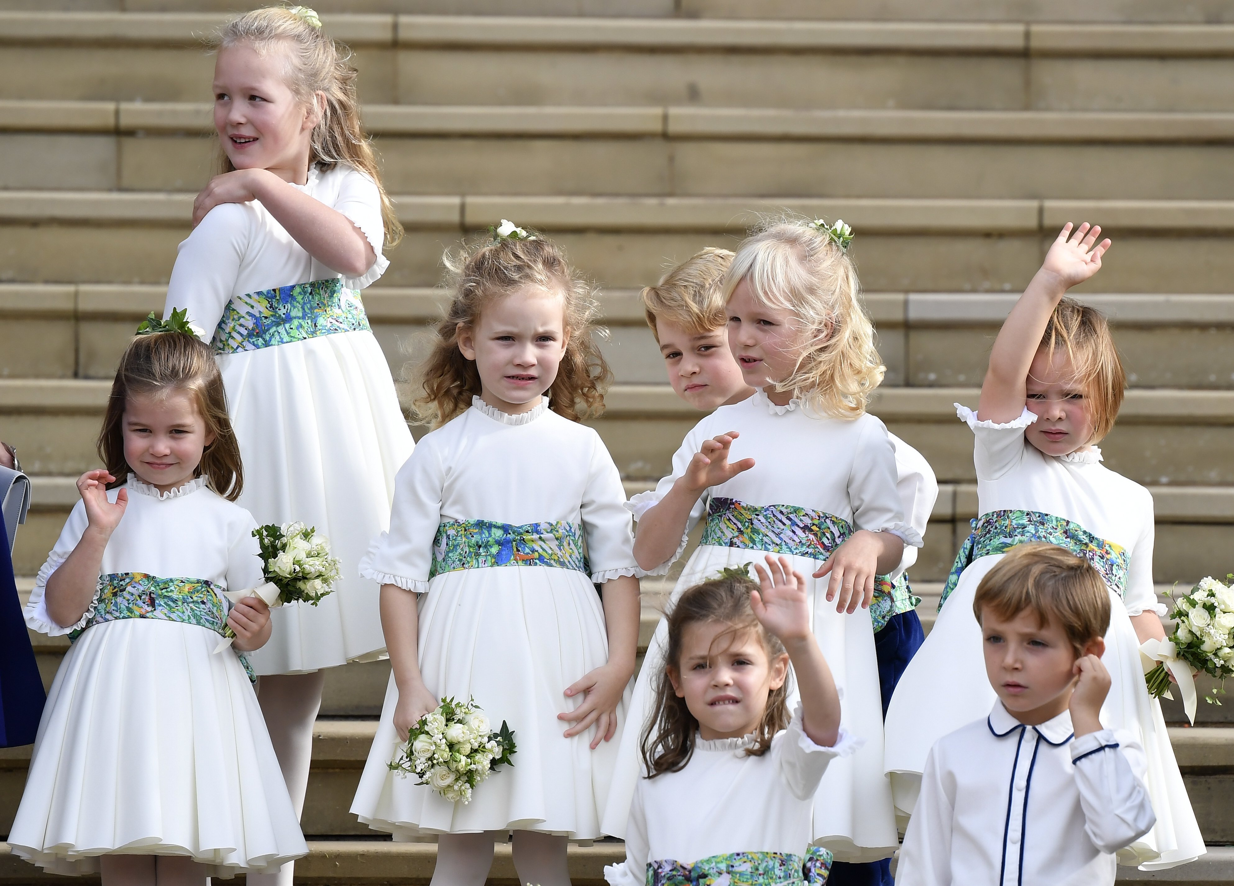Bridesmaids Princess Charlotte, Savannah Phillips, Maud Windsor, page boy Prince George, bridesmaids Isla Phillips, Theodora Williams, Mia Tindall and page boy Louis de Givenchy pictured leaving after the royal wedding of Princess Eugenie of York to Jack Brooksbank at St. George's Chapel on October 12, 2018 in Windsor, England | Source: Getty Images