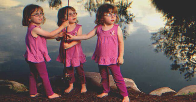 Maisy noticed three lonely triplet girls fishing in the pond. | Source: Shutterstock