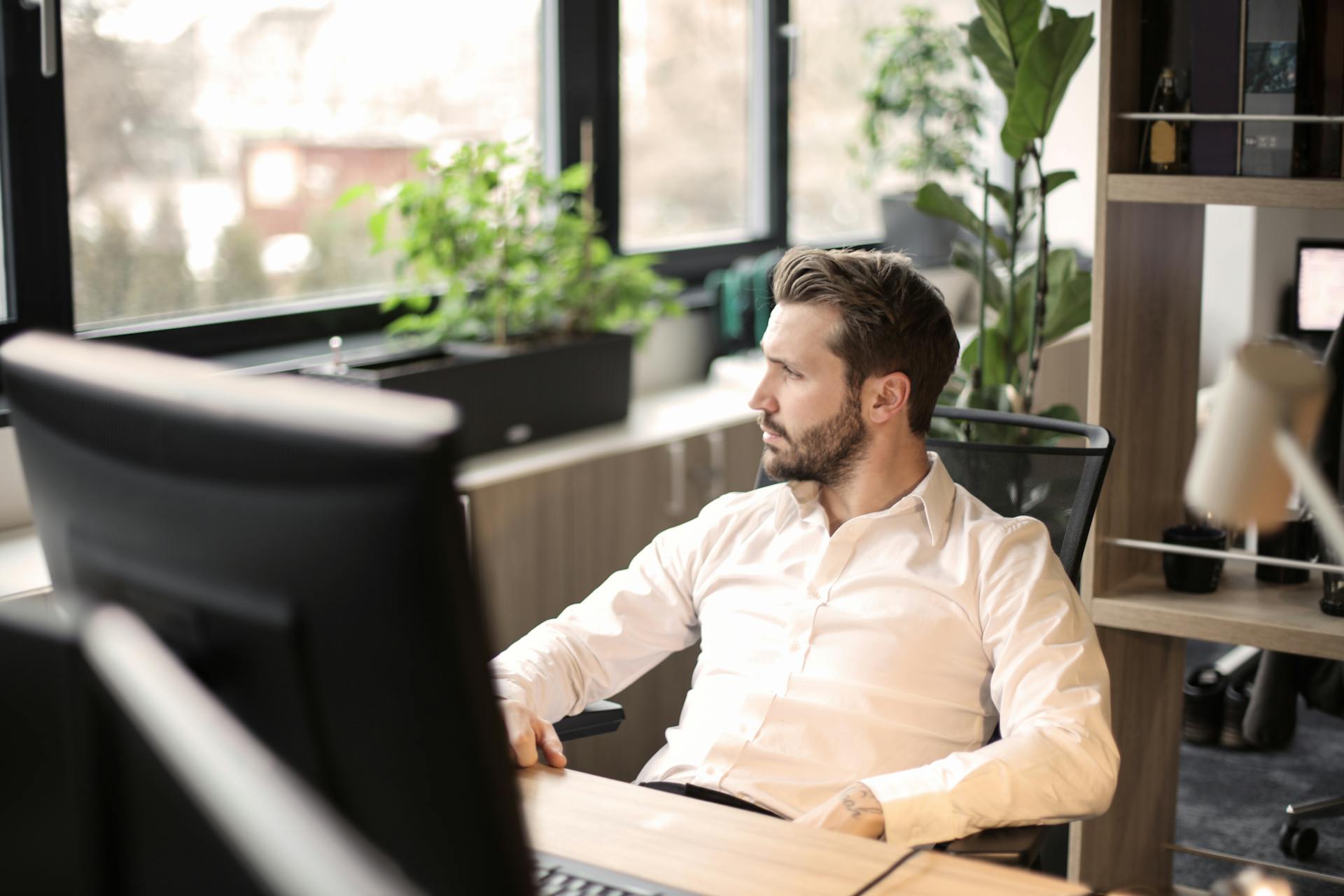 A man sitting in his office | Source: Pexels