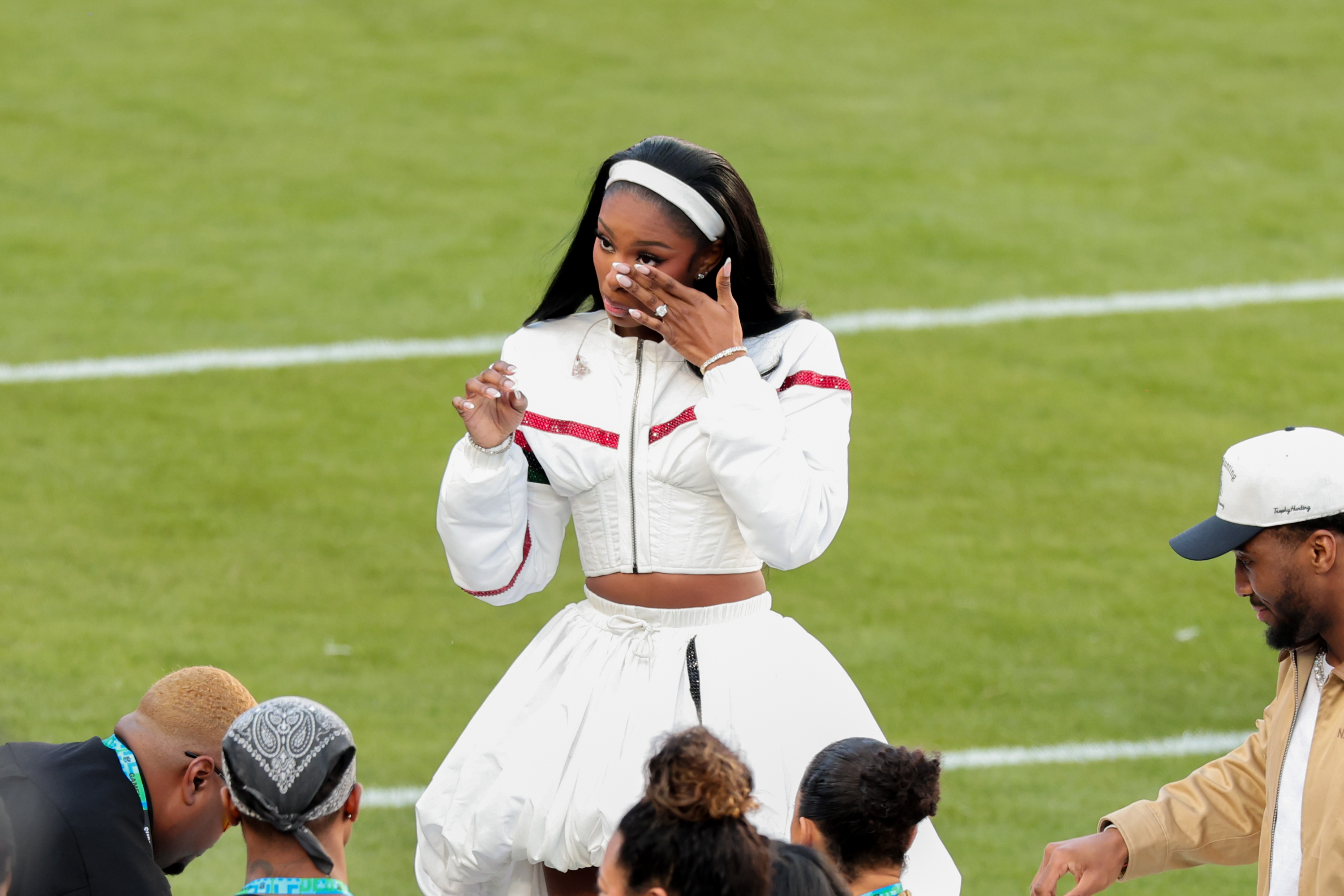 Coco Jones shedding a few tears following her performance at the Super Bowl LX in Santa Clara, California on February 8, 2026. | Source: Getty Images