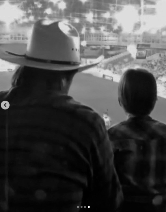 Chuck Norris and a young Dakota attend an event together, seen from behind, as posted on March 19, 2026 | Source: Instagram/d.ak.ot.a