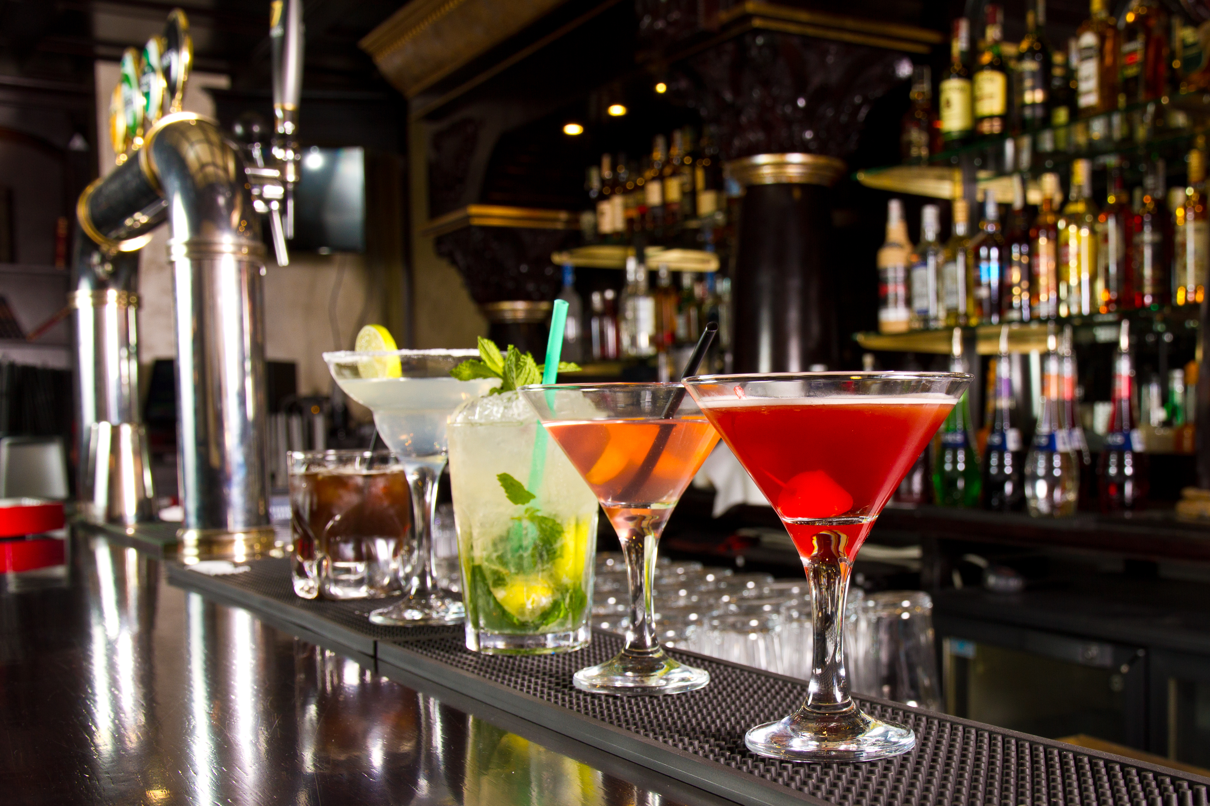 Five cocktails on the bar counter. | Source: Shutterstock