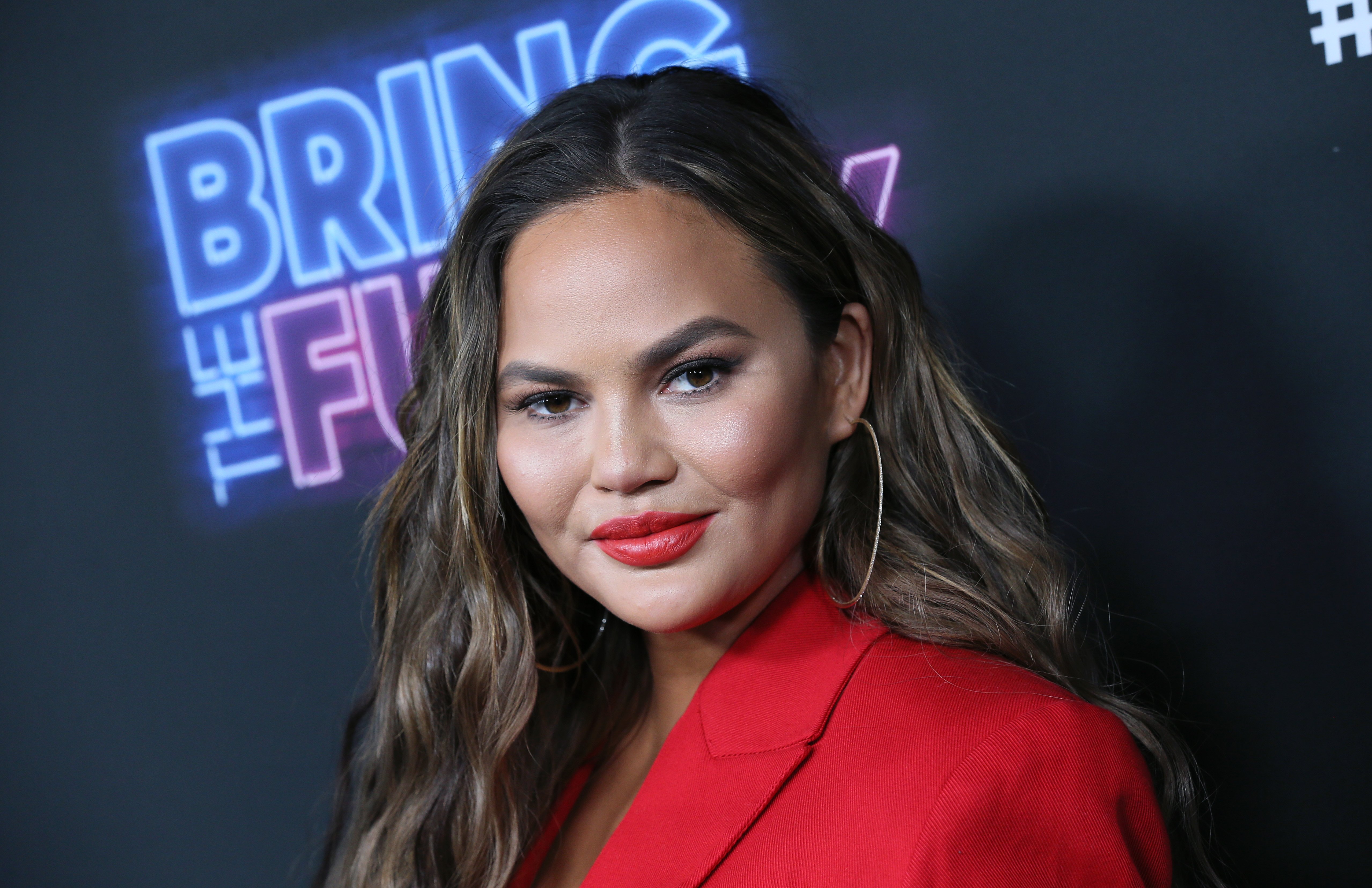 Chrissy Teigen attends the premiere of NBC's "Bring The Funny" at Rockwell Table & Stage on June 26, 2019, in Los Angeles, California. | Source: Getty Images.